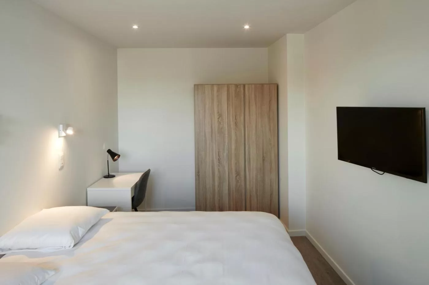 Bed in Alpha Hotel and Aparthotel