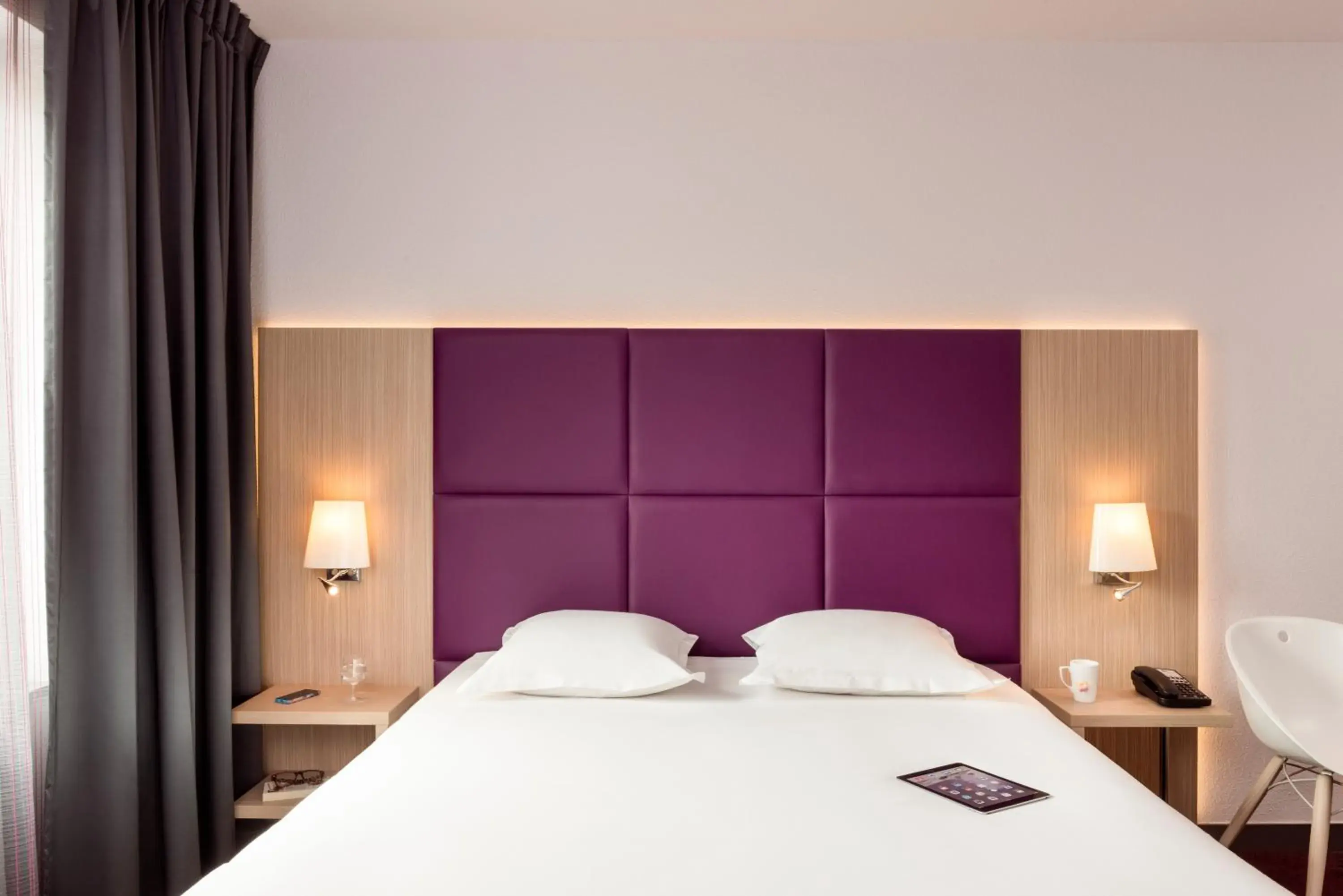 Bed in Aparthotel Adagio Paris Malakoff Chatillon Bed in Aparthotel Adagio Paris Malakoff Chatillon