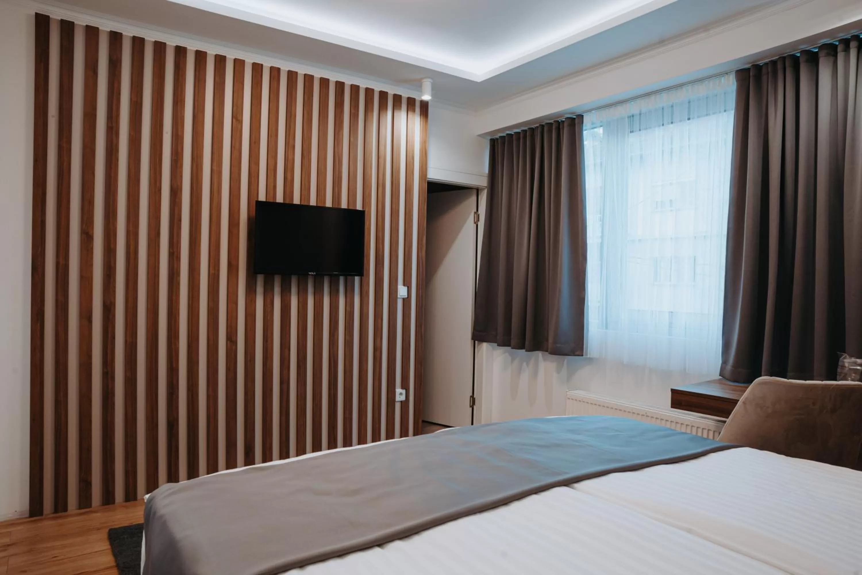 Bed in Boutique Hotel Nea