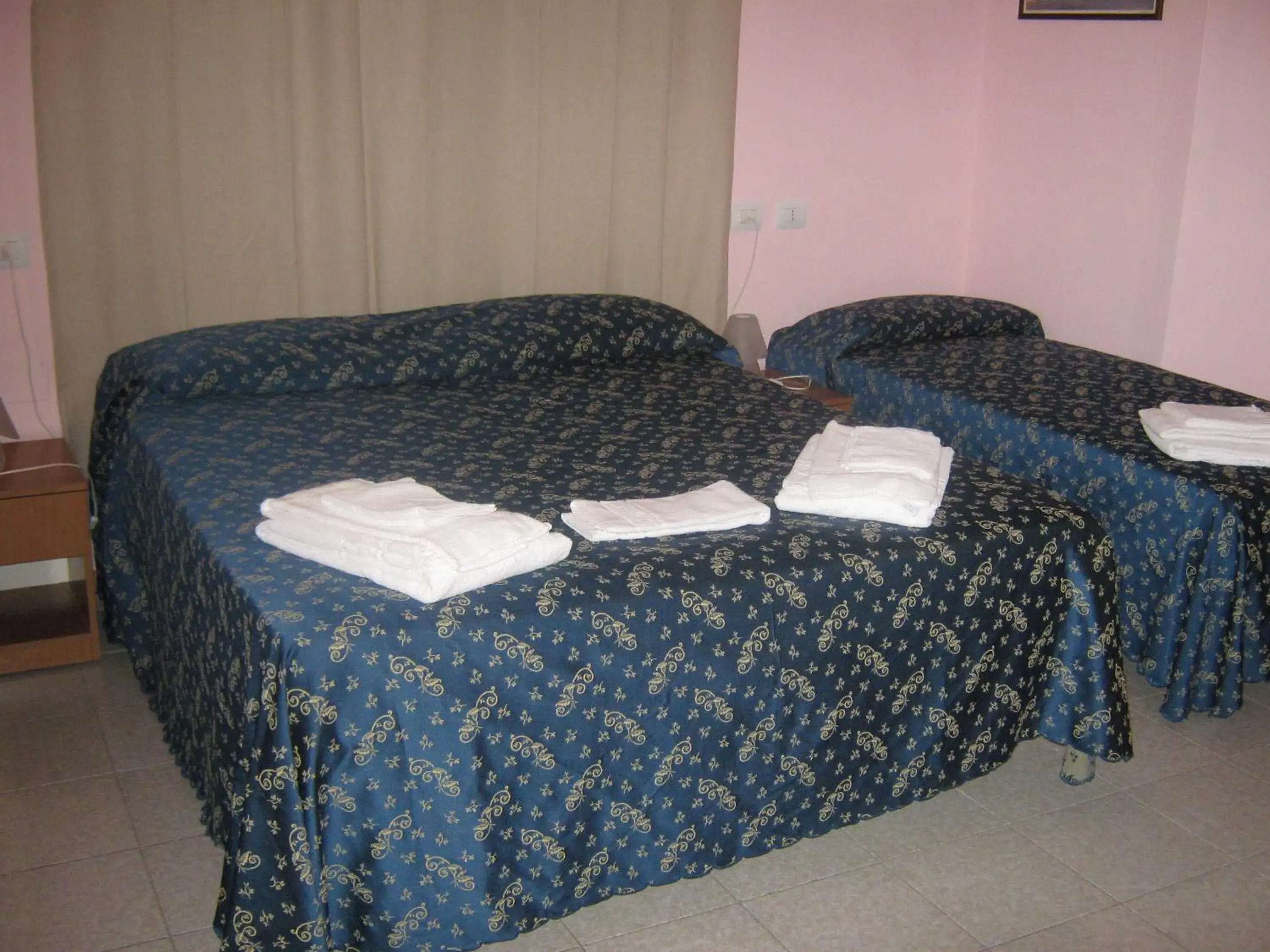 Bed in Hotel Ferraro