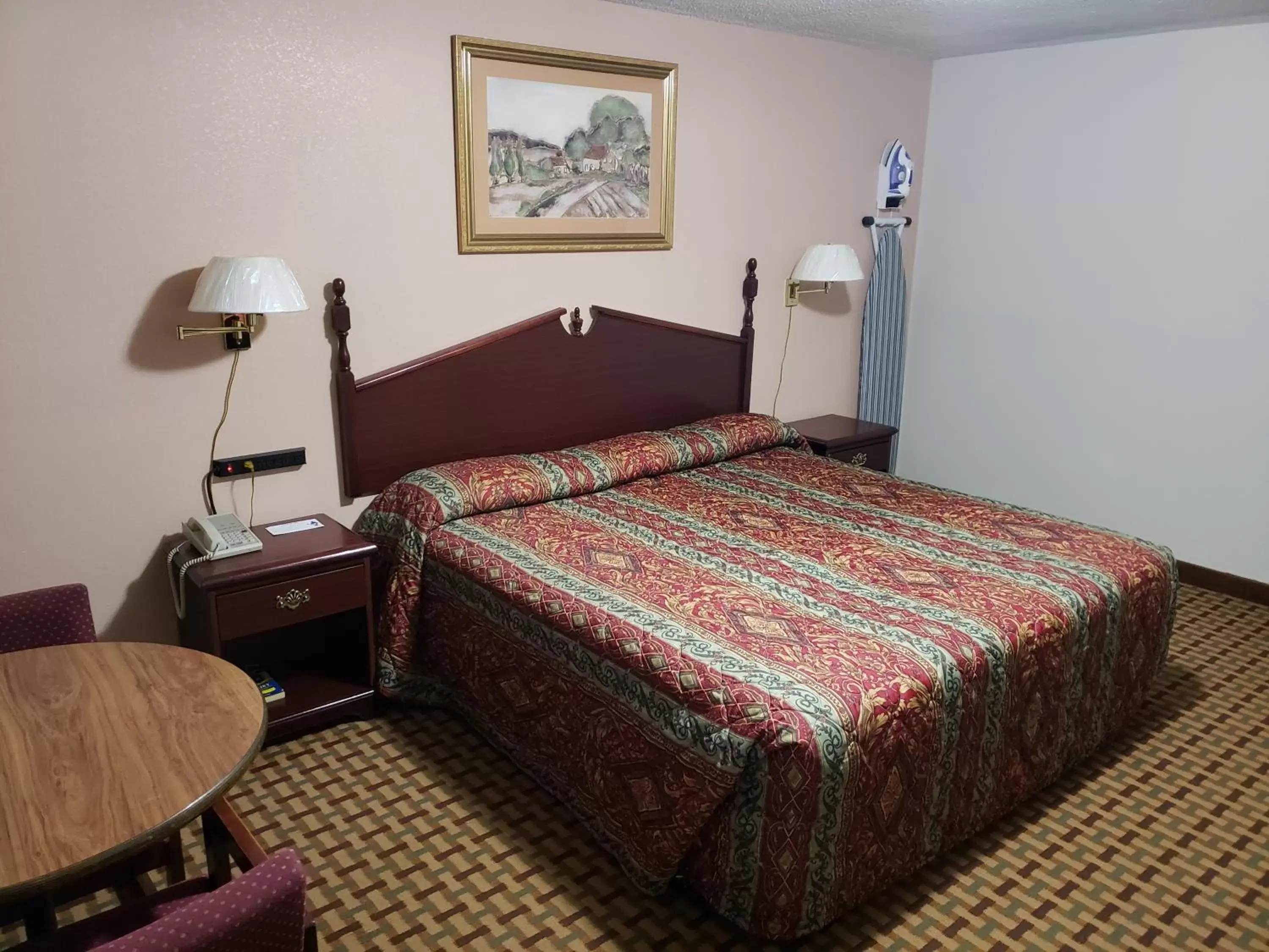 Bed in River Heights Motel