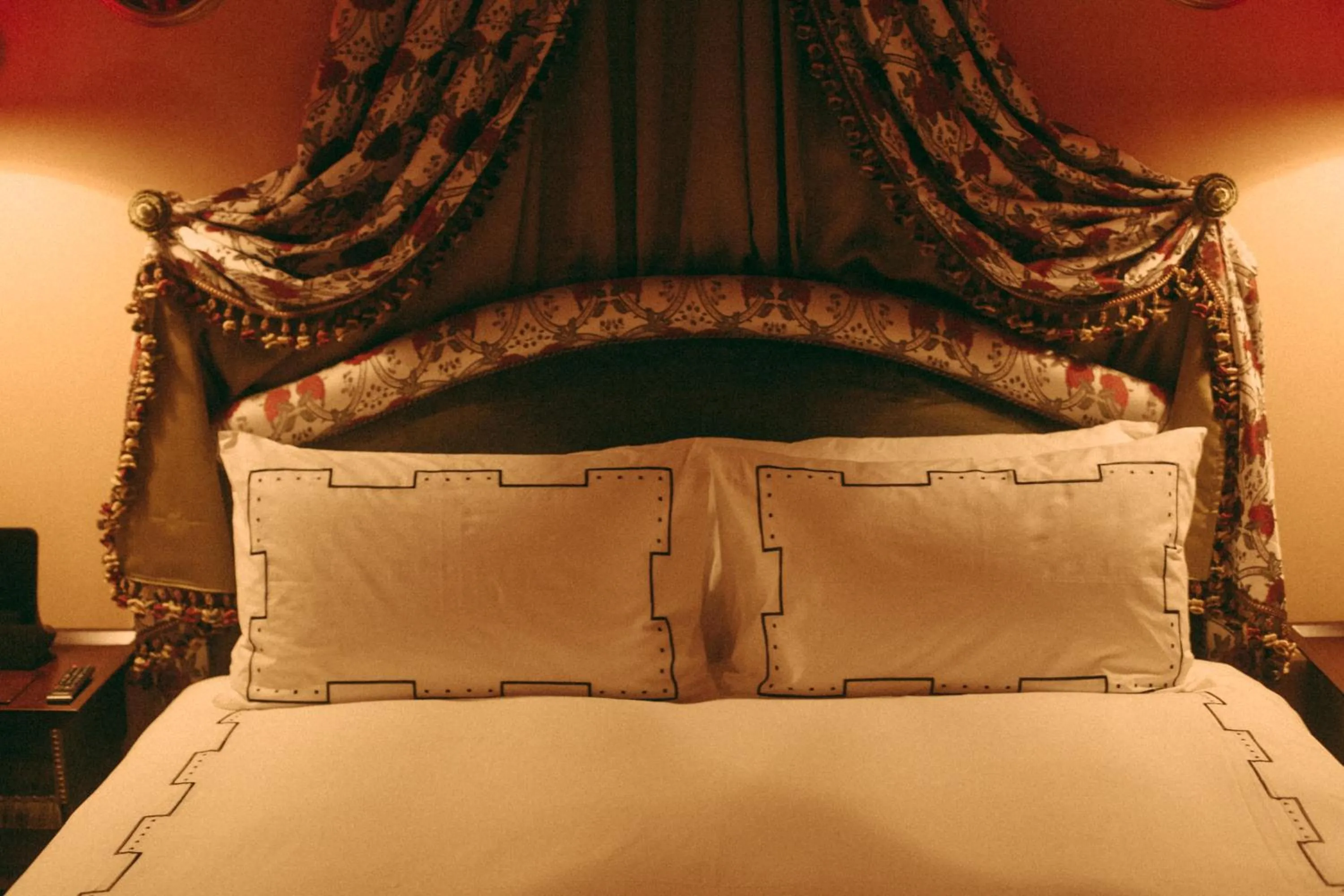 Bedroom in L'Escape Hotel