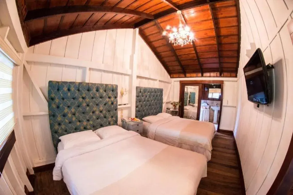 Bed in Hotel Finca Lerida Coffee Plantation and Boutique Hotel