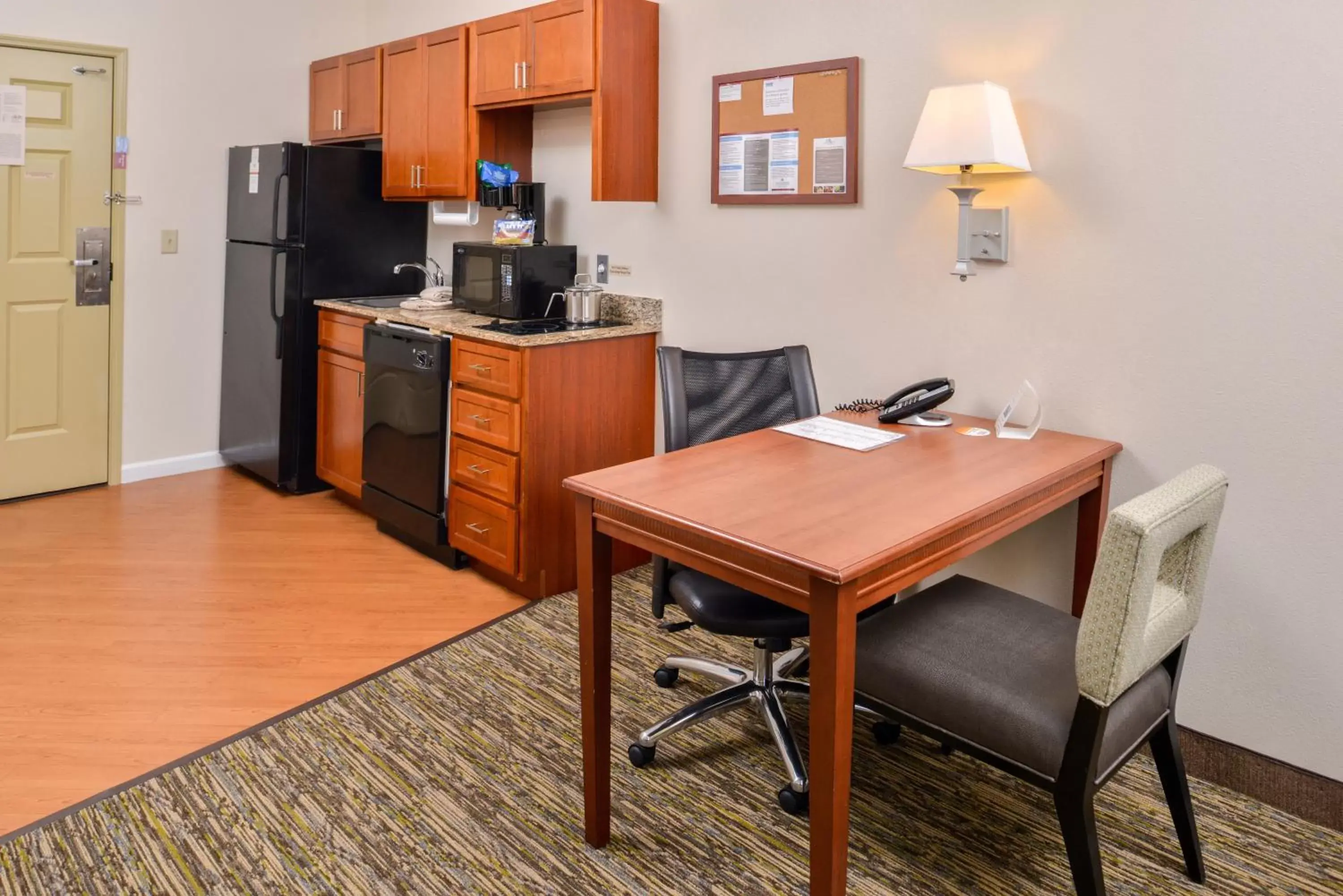 Photo of the whole room, Kitchen/Kitchenette in Candlewood Suites Abilene, an IHG Hotel