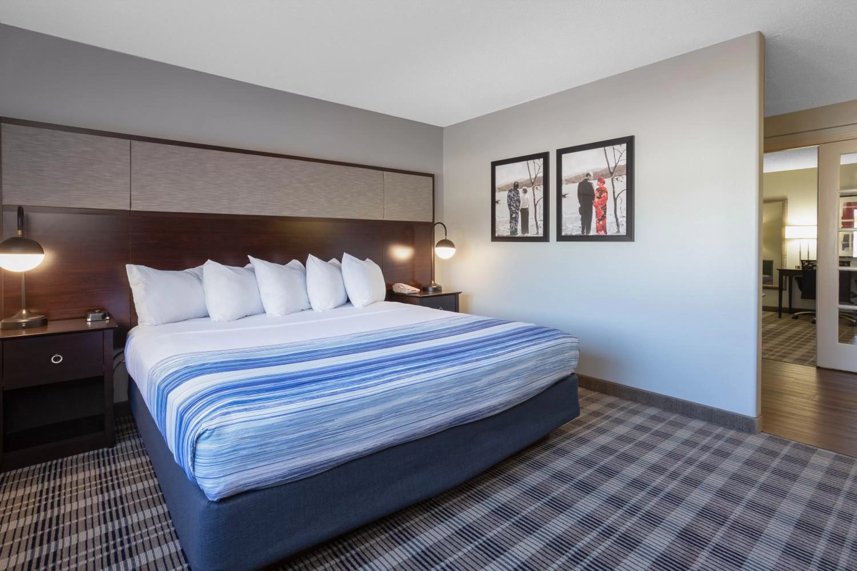 Bedroom, Bed in AmericInn by Wyndham Madison South