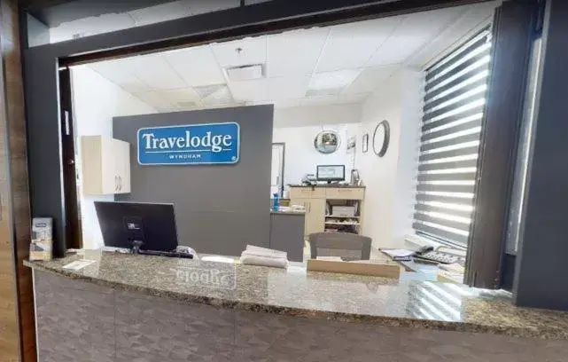 Text overlay in Travelodge by Wyndham Alma