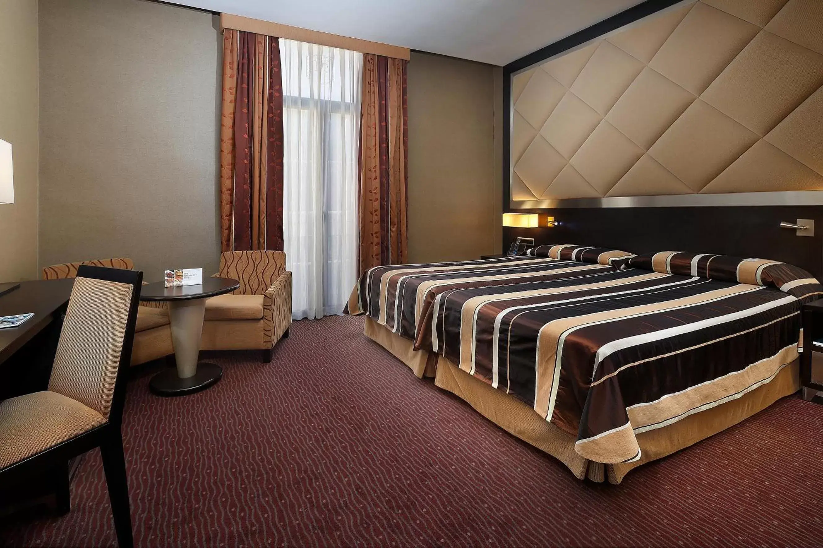 Photo of the whole room, Bed in HCC St. Moritz