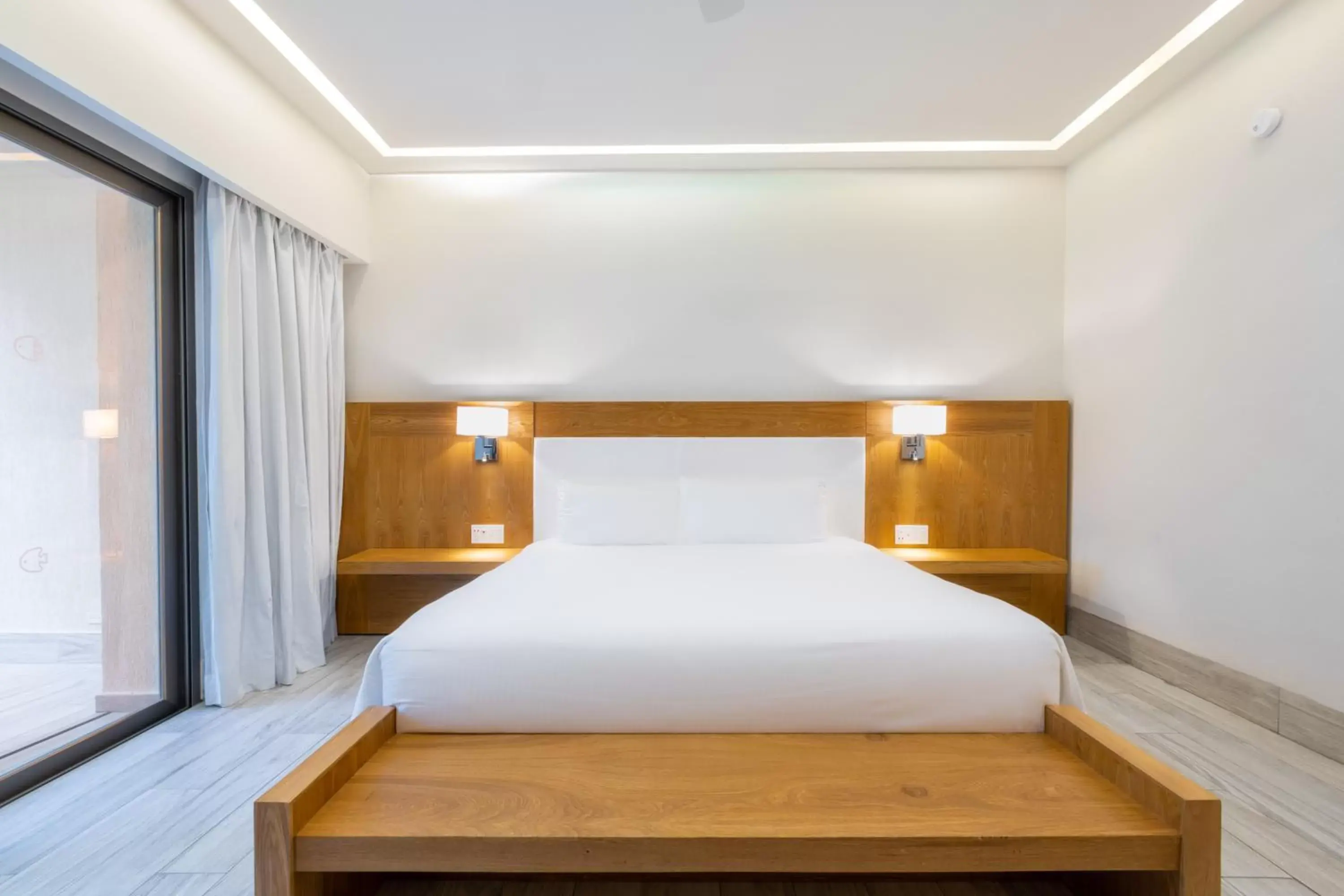 Bed in Izla Beach Front Hotel