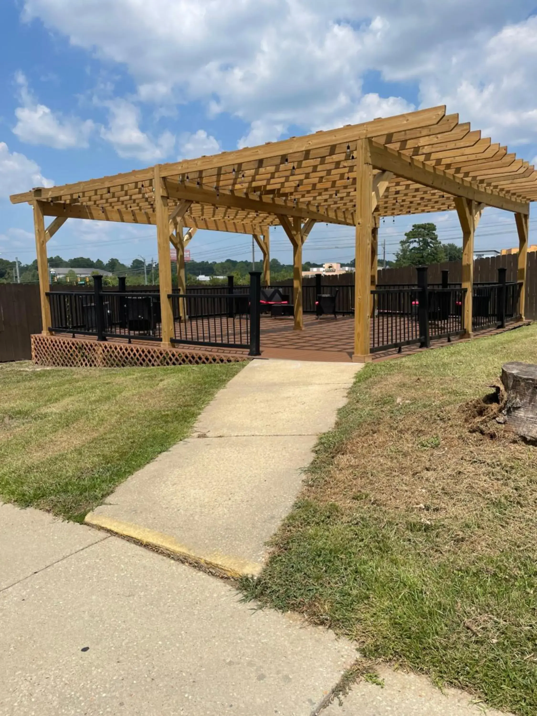 Patio, Property Building in Ramada by Wyndham Studio Suites Dothan