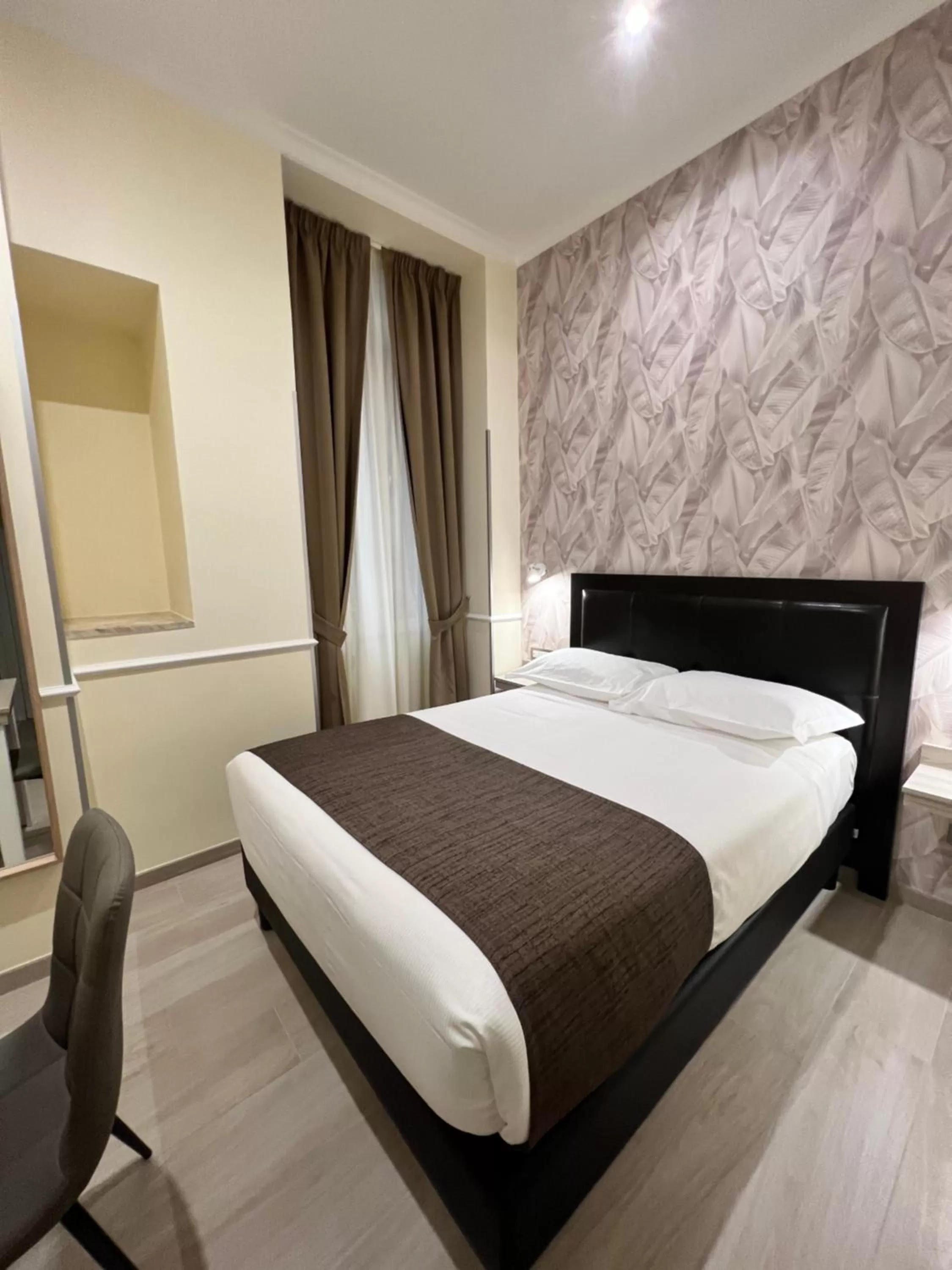 Bed in Hotel Le Petit