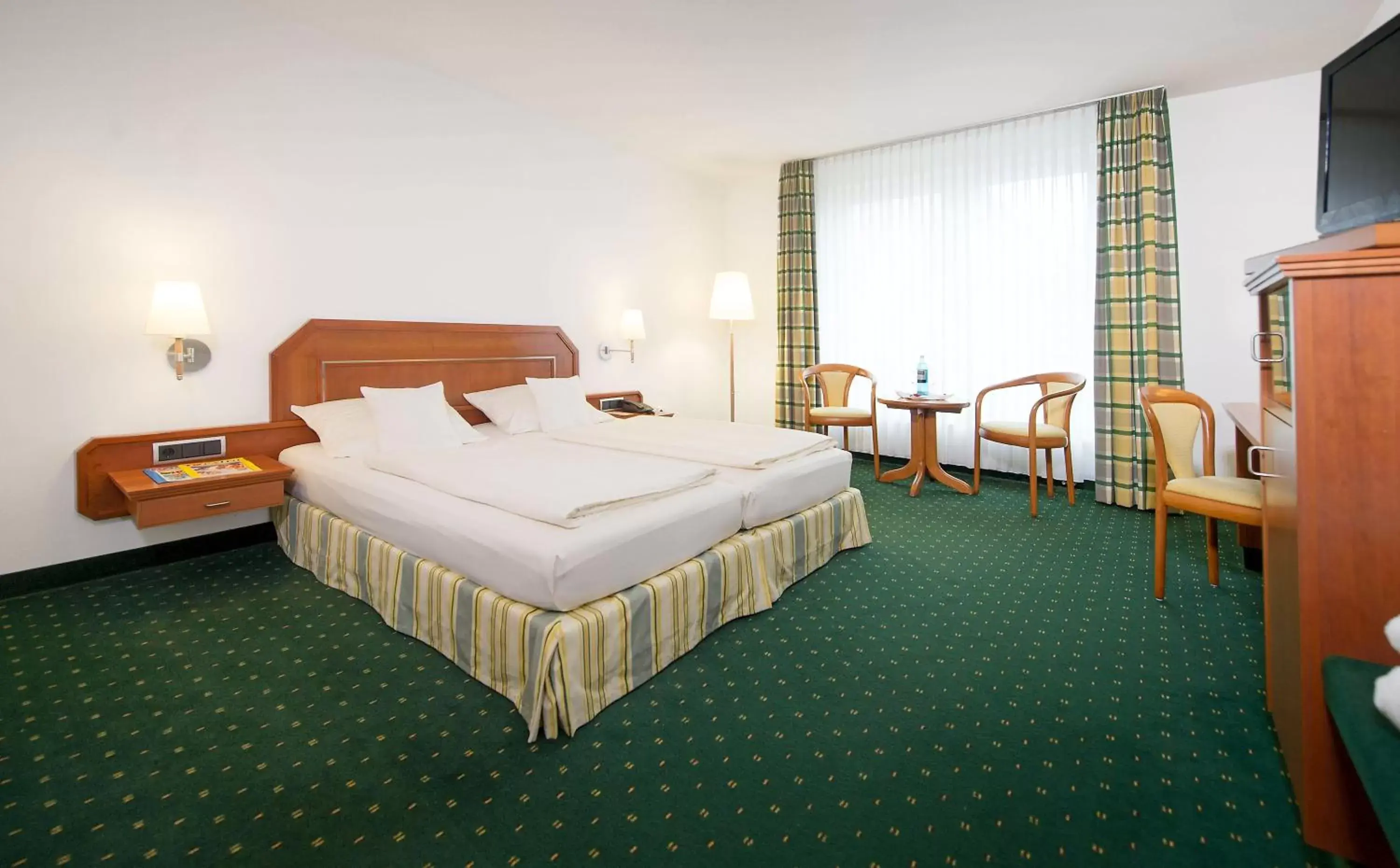 Photo of the whole room, Bed in Maifeld Sport- und Tagungshotel