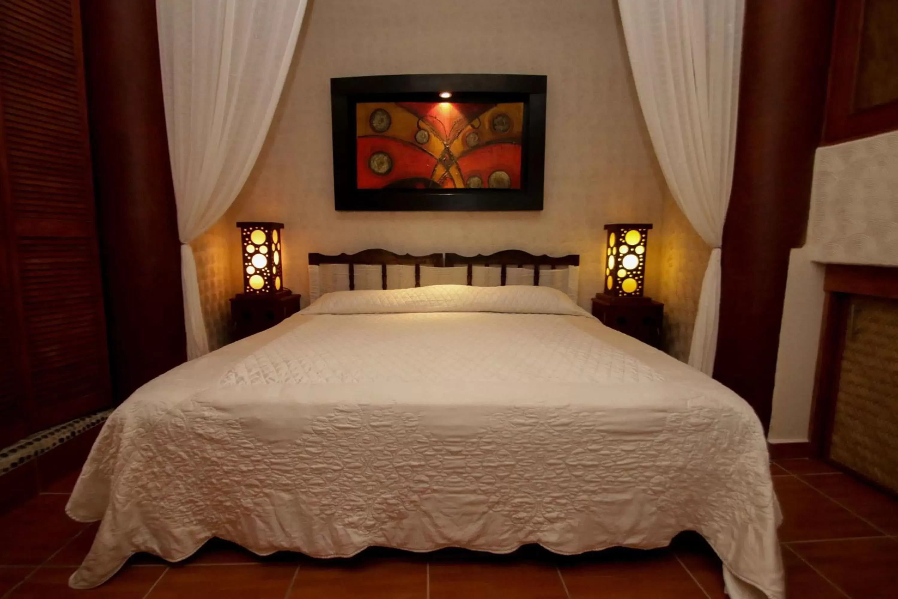 Bed in Hotel Villas Las Azucenas