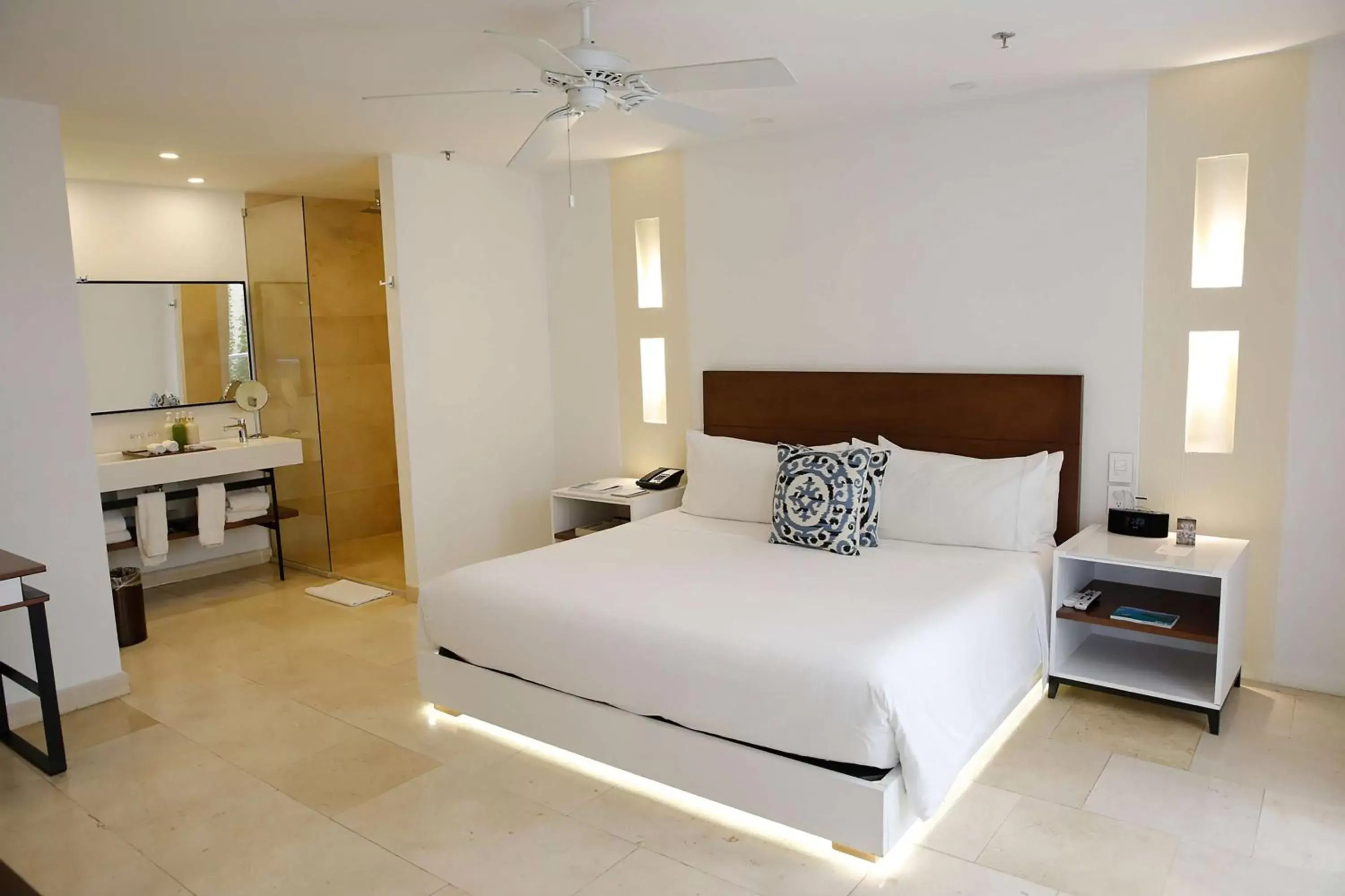 Bed in Nacar Hotel Cartagena, Curio Collection by Hilton