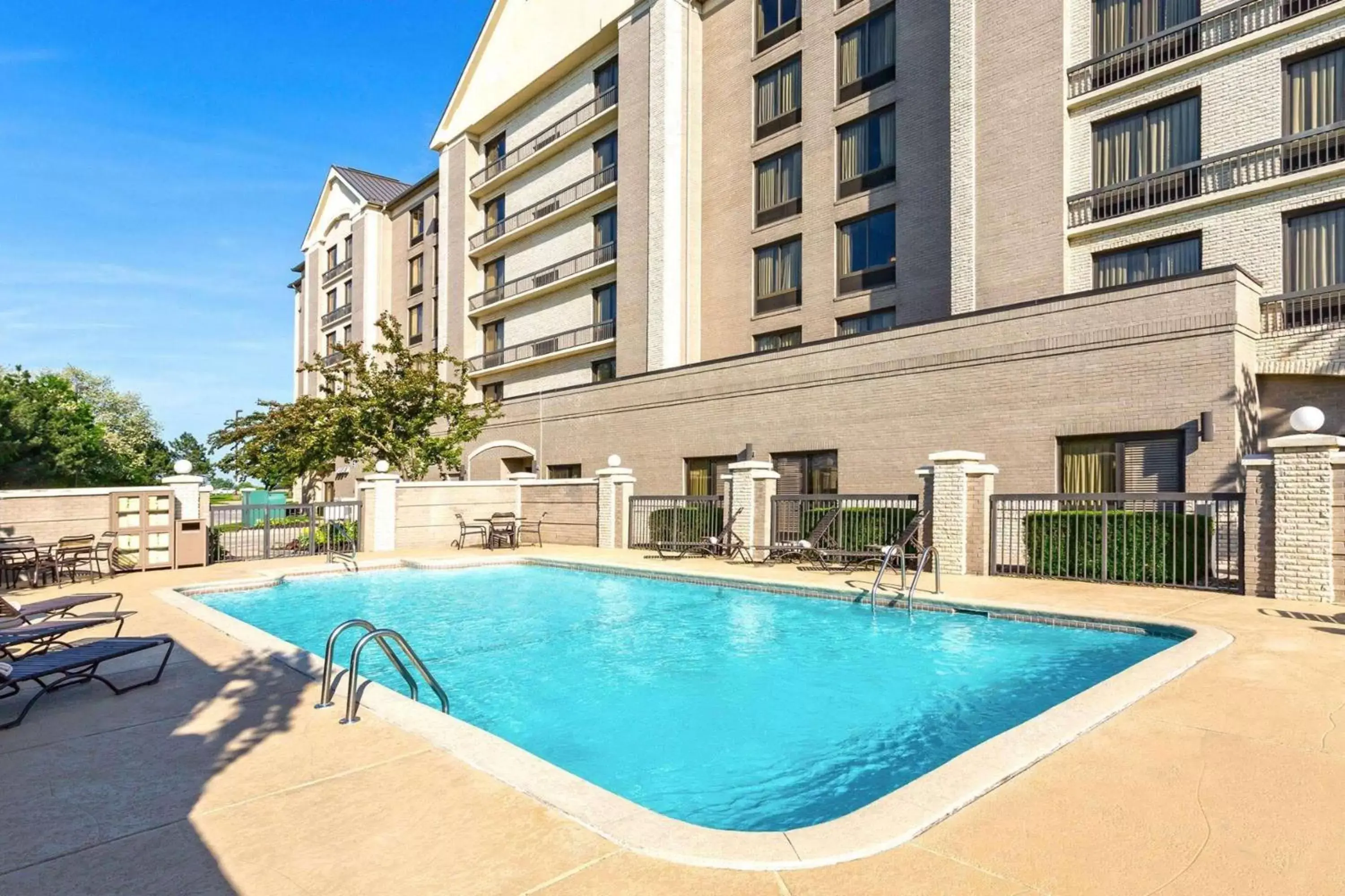 Pool view, Property Building in Wyndham Garden Kansas City Airport