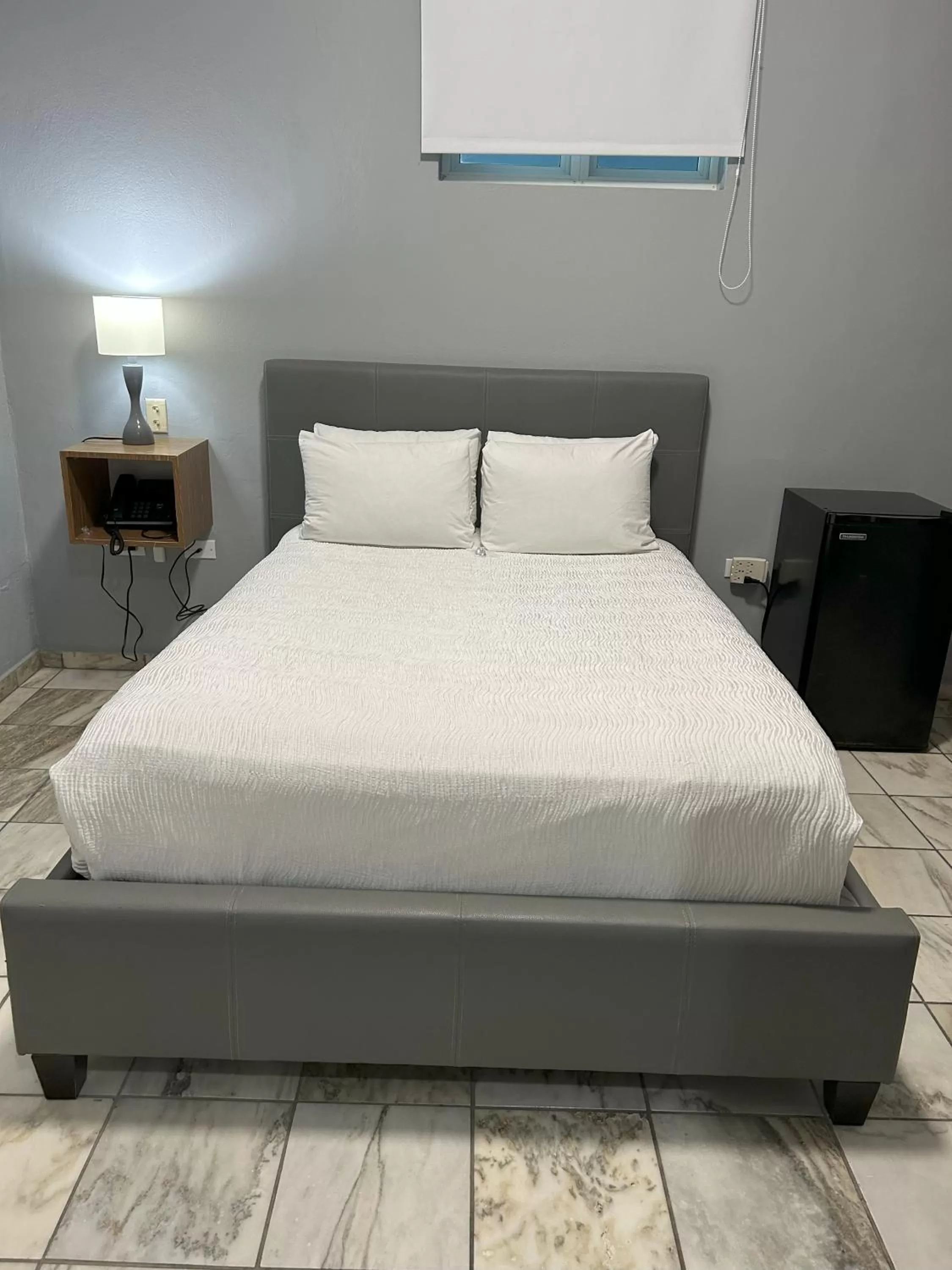 Bed in Coral Princess Hotel