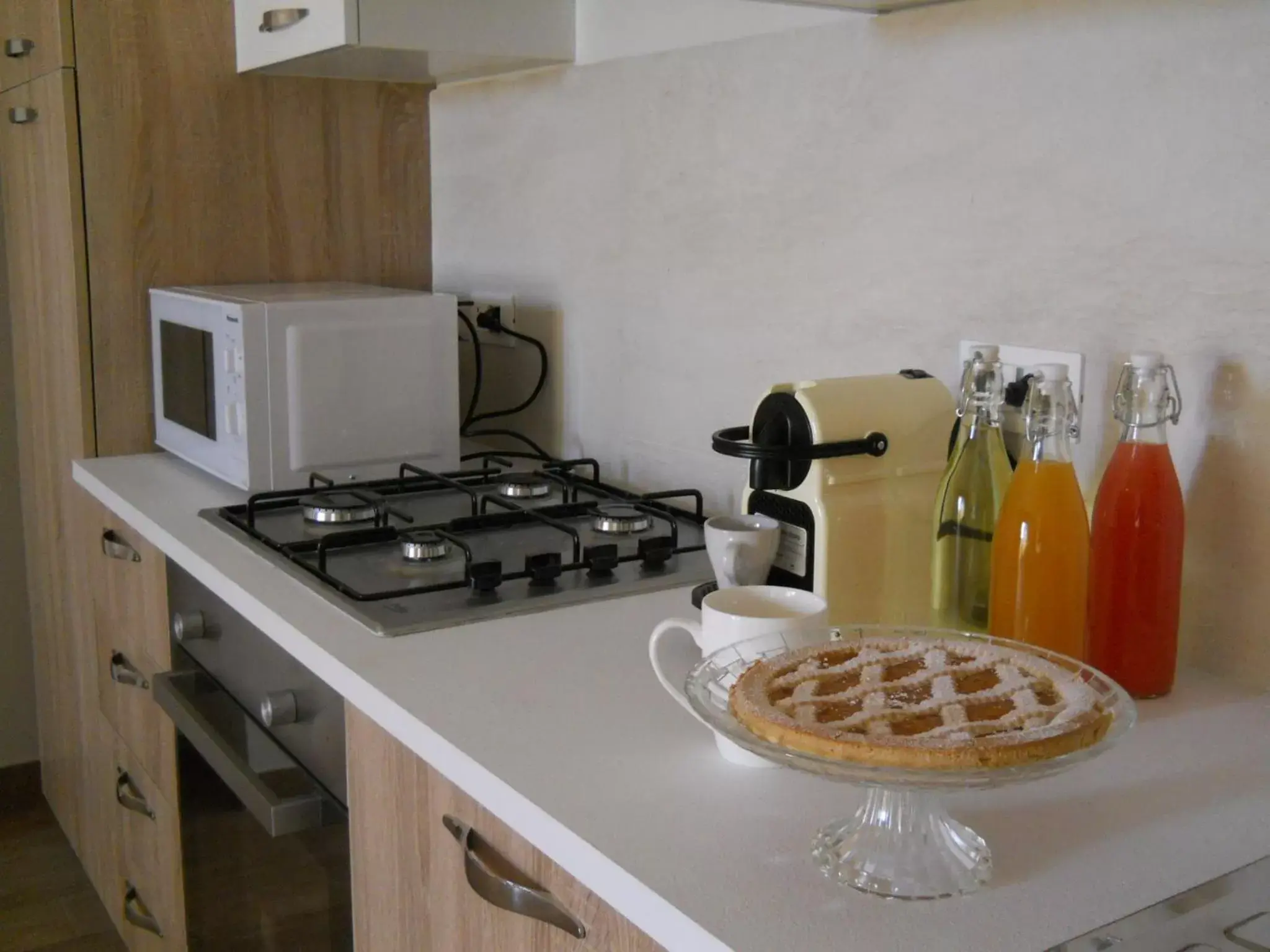 Communal lounge/ TV room, Kitchen/Kitchenette in La Creta b&b