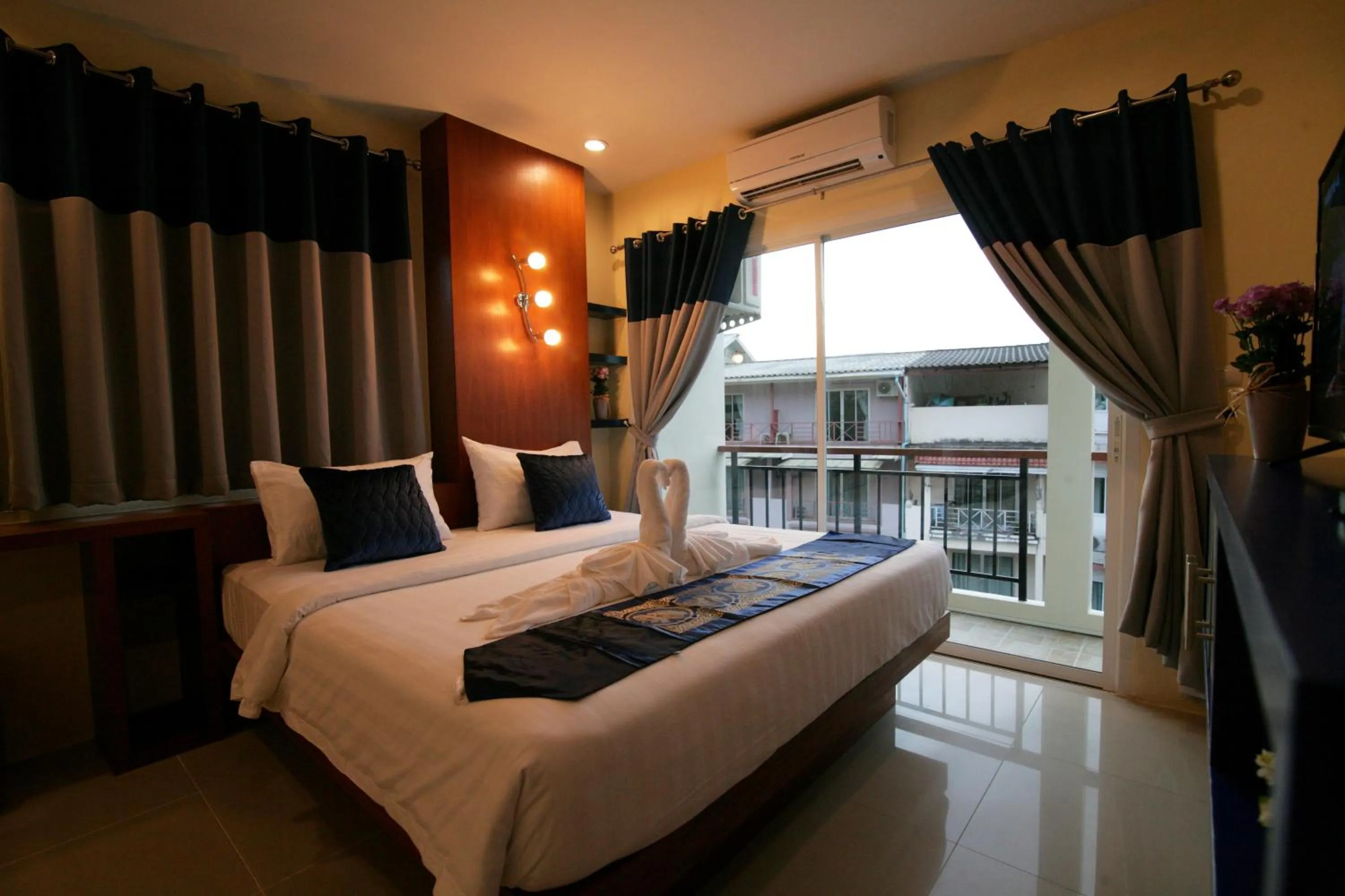 Bed in Calypso Patong Hotel