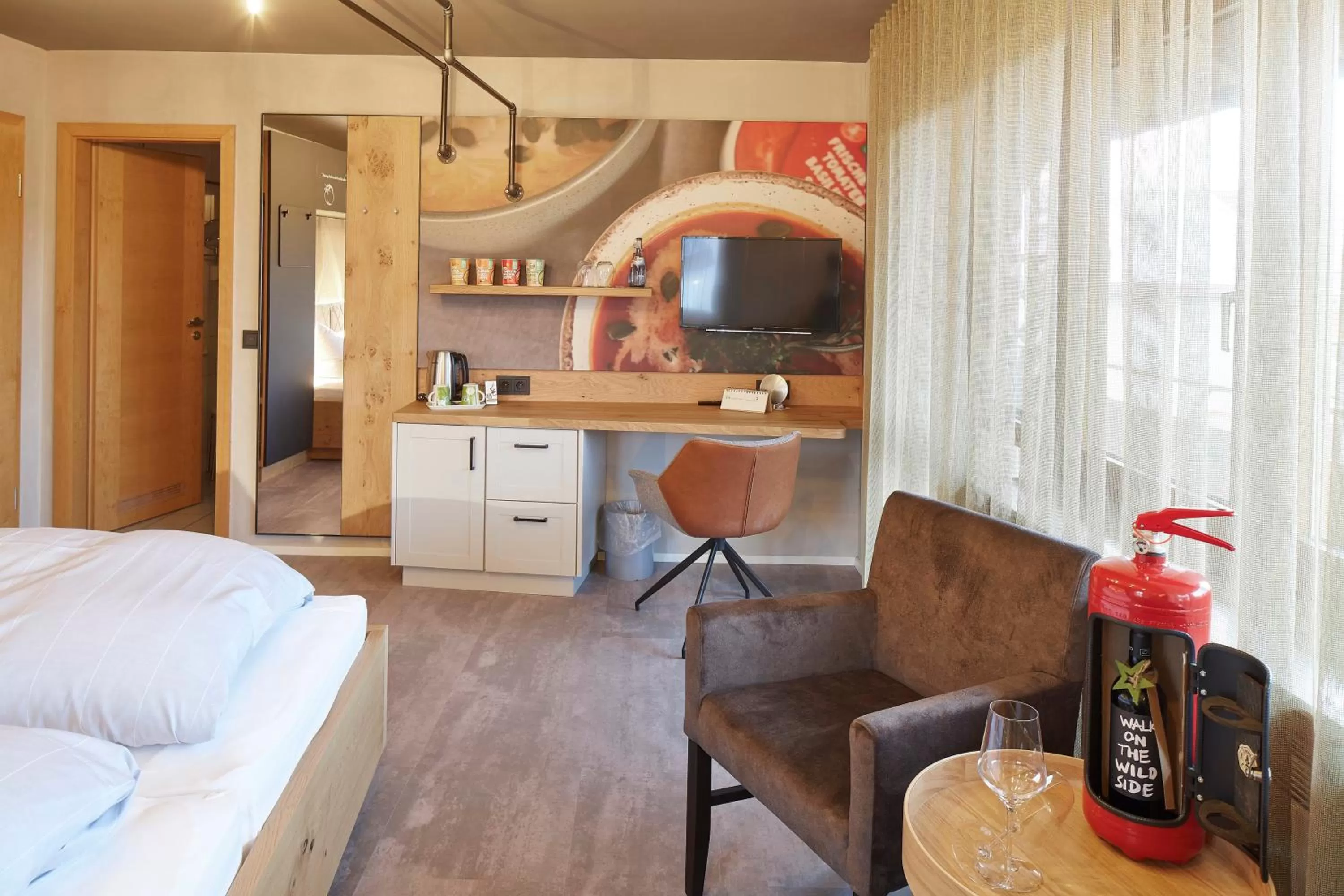 Living room, Bed in Biohotel-Restaurant Rose