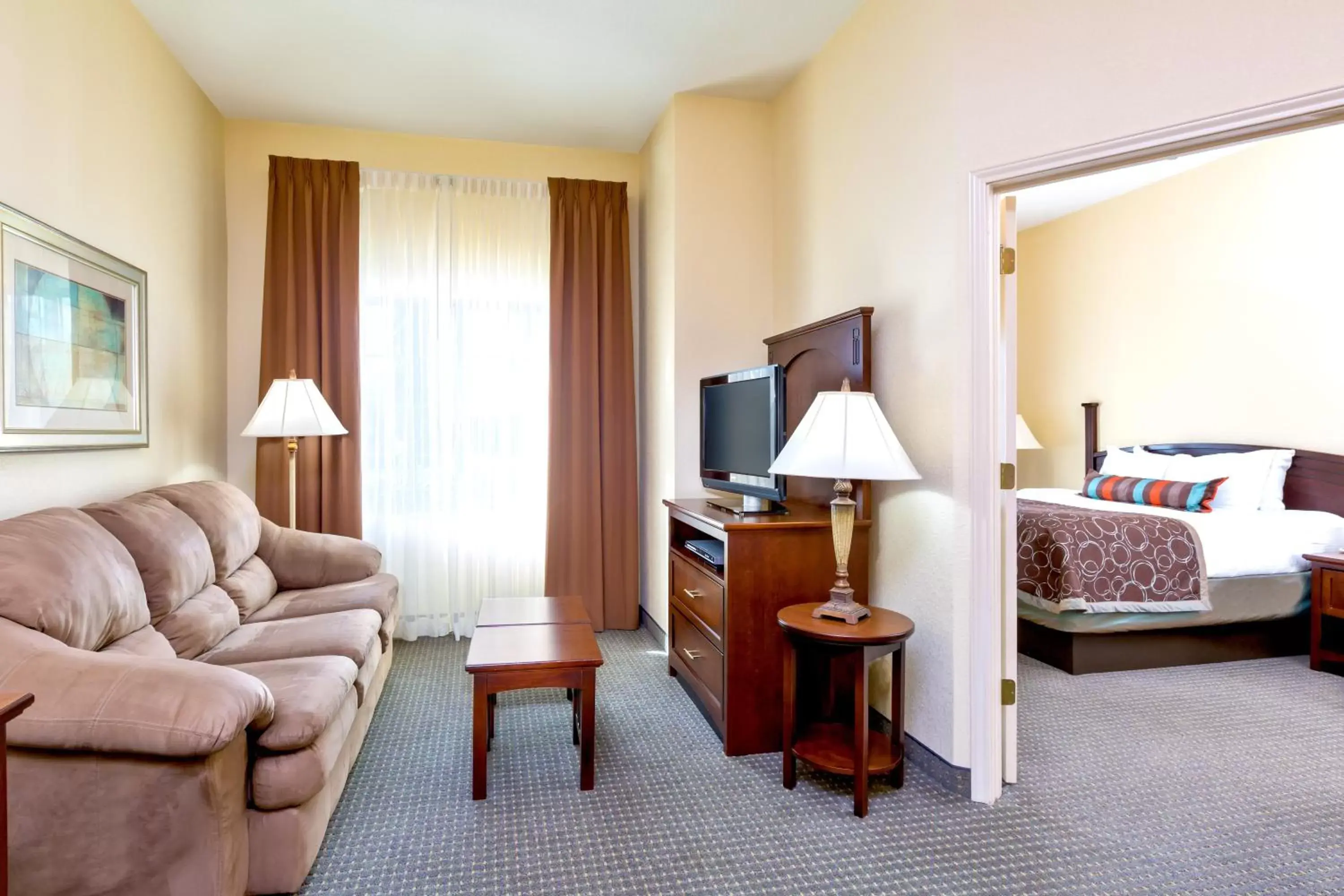 Photo of the whole room, Seating Area in Staybridge Suites McAllen, an IHG Hotel