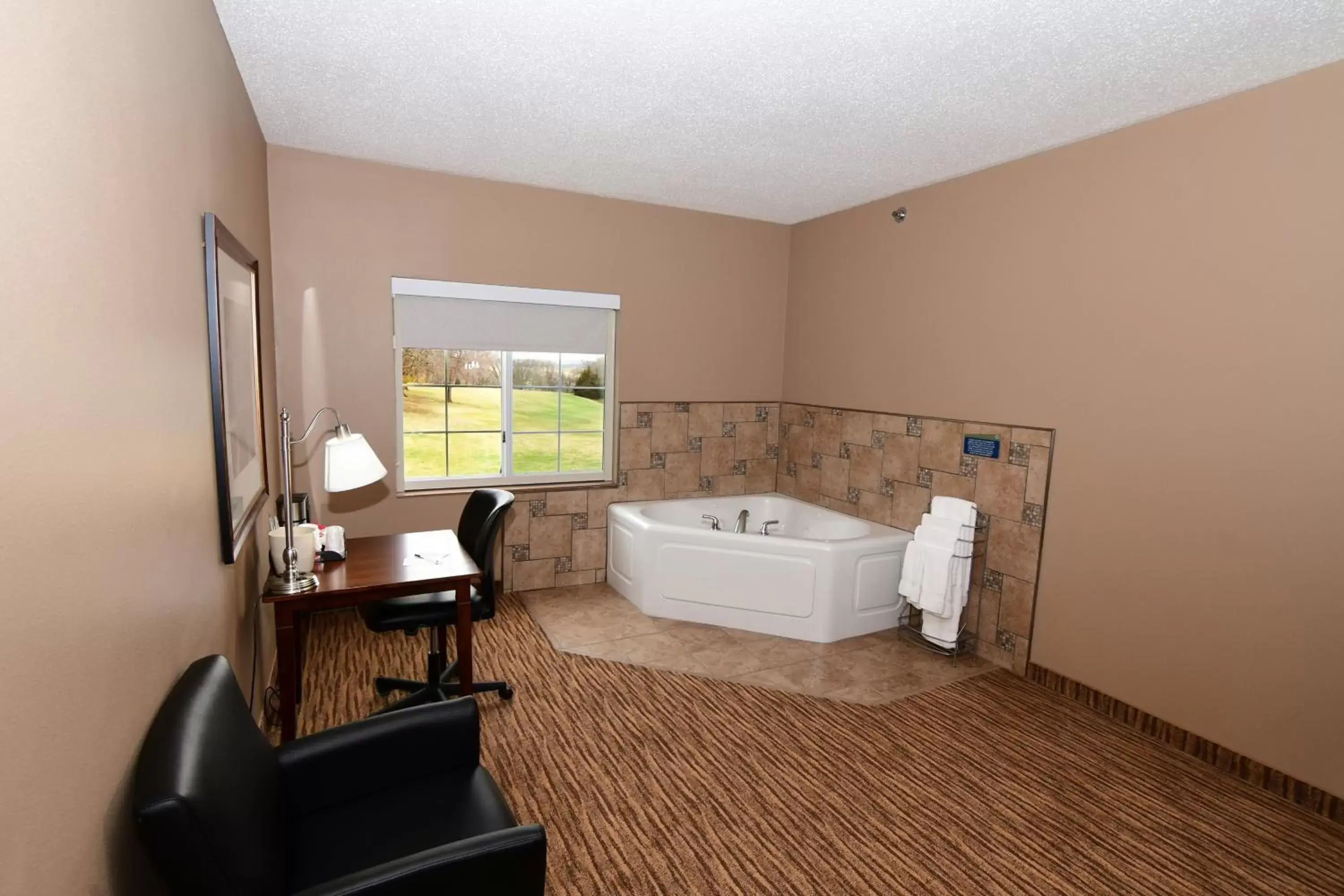 Bath, Bathroom in Cobblestone Inn & Suites - Denison | Majestic Hills