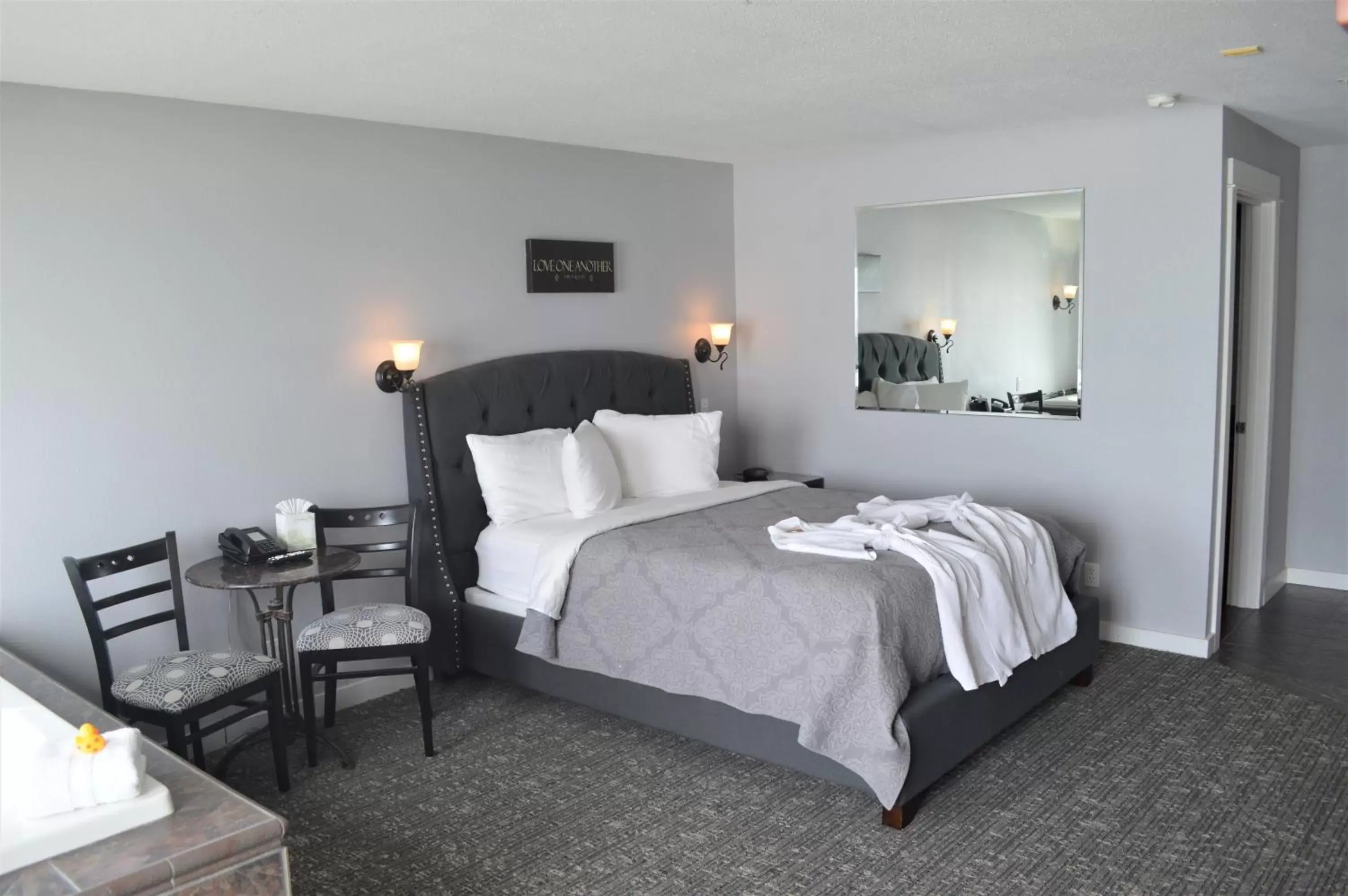 Bed in Starfish Manor Oceanfront Hotel