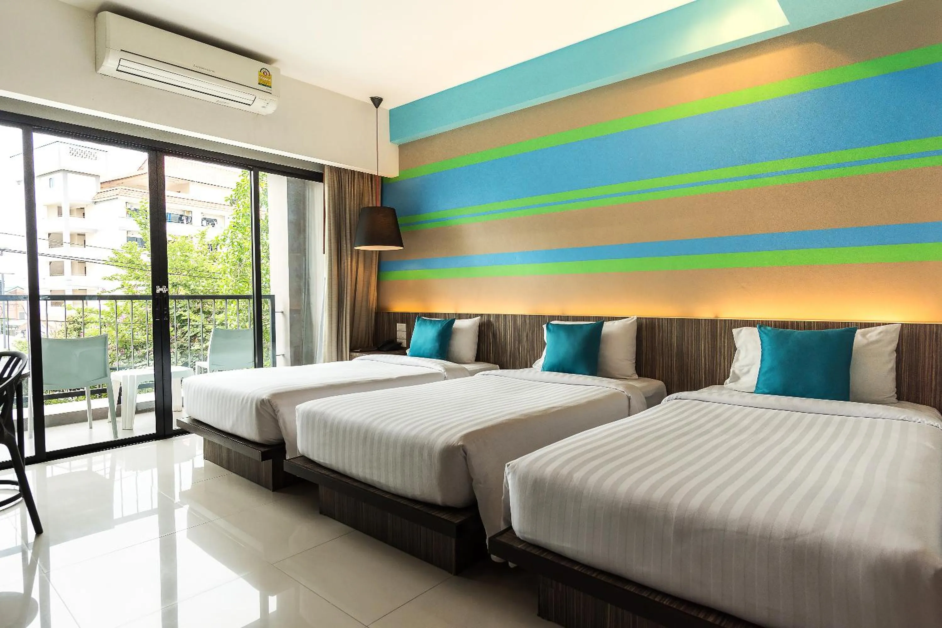 Bed in Hotel J Residence Pattaya