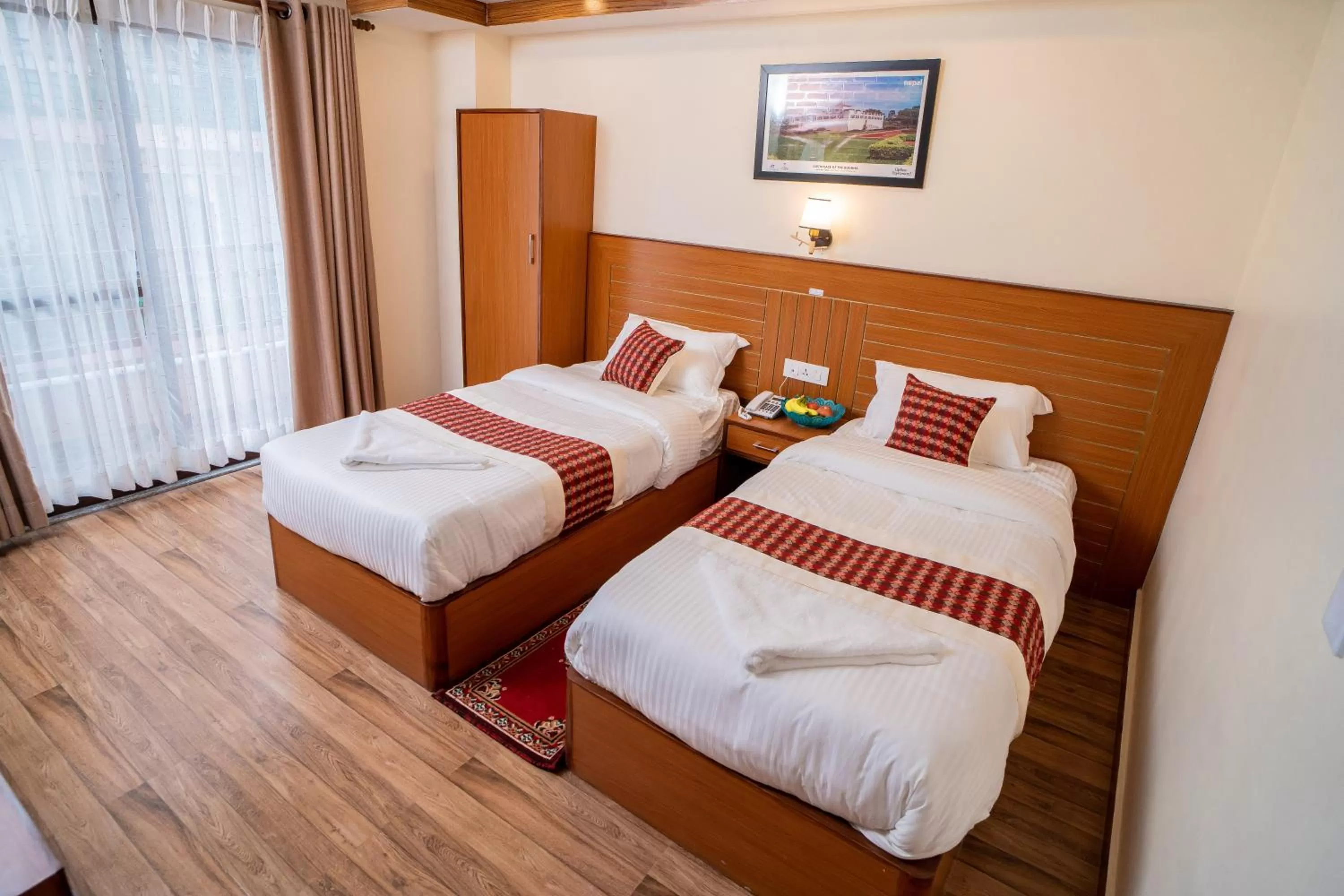 Bed in Madhuban Hotel