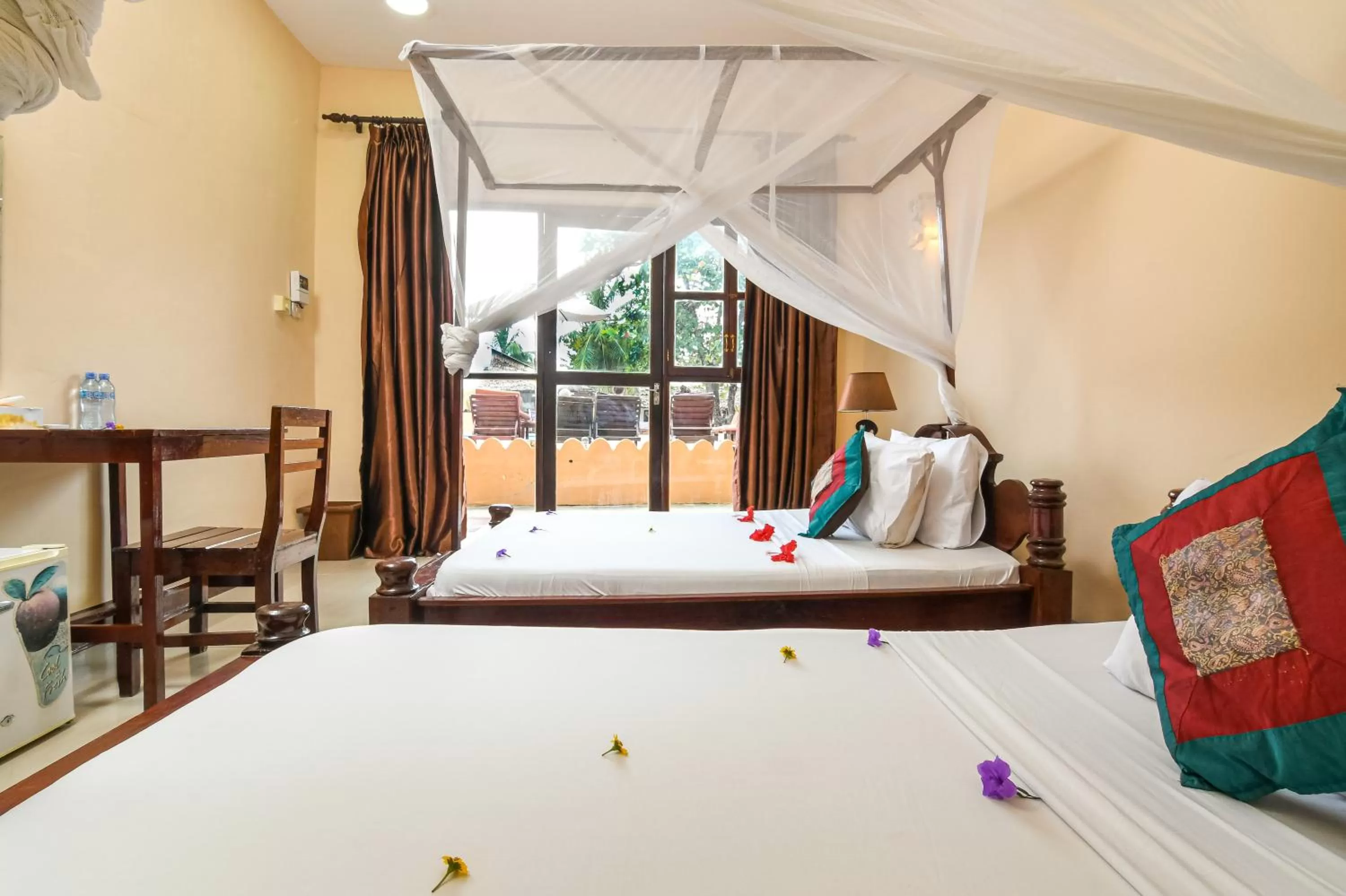 Bed in Amaan Beach Bungalows