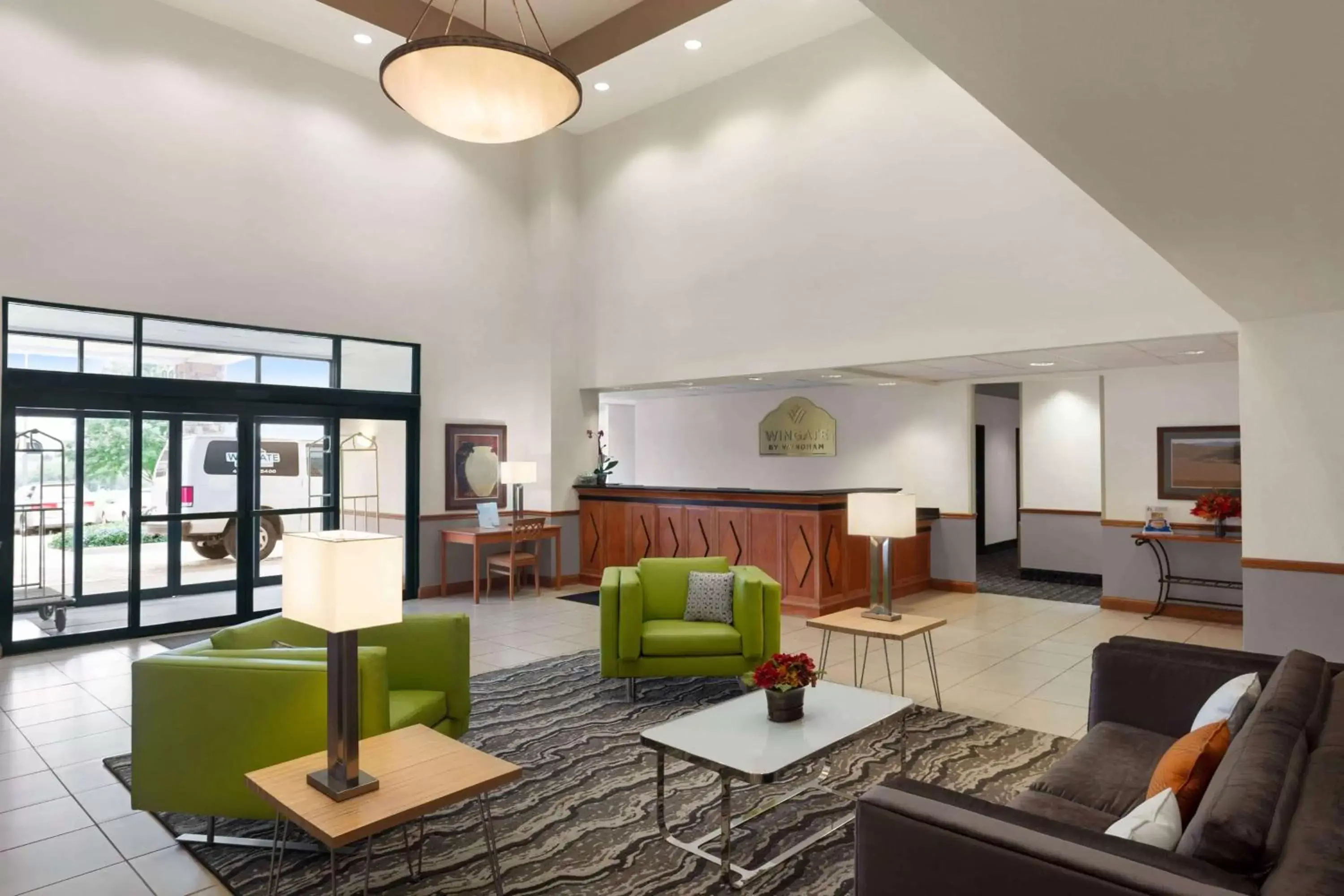 Lobby or reception in Wingate by Wyndham Bentonville Lobby or reception in Wingate by Wyndham Bentonville