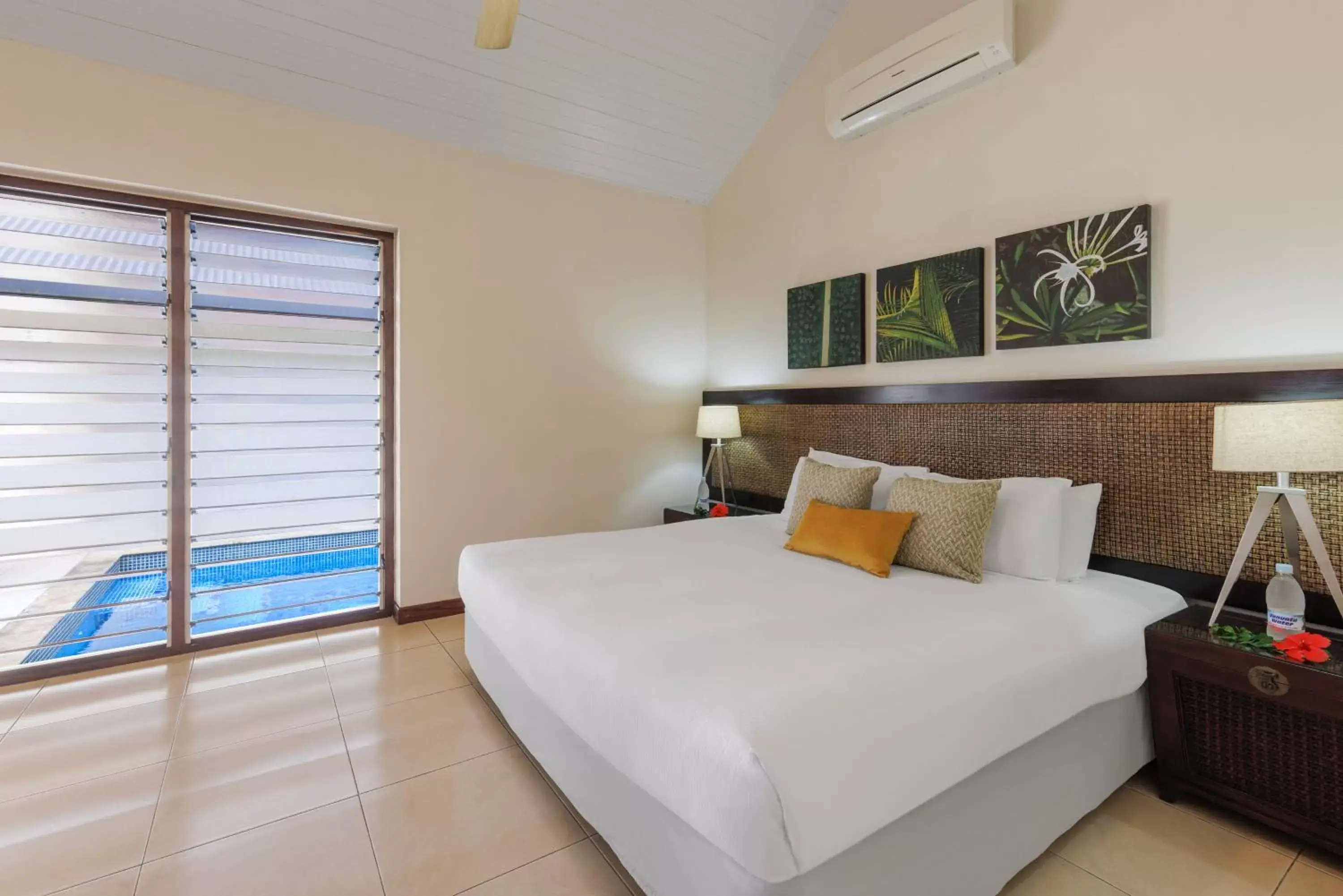 Bed in Mangoes Resort