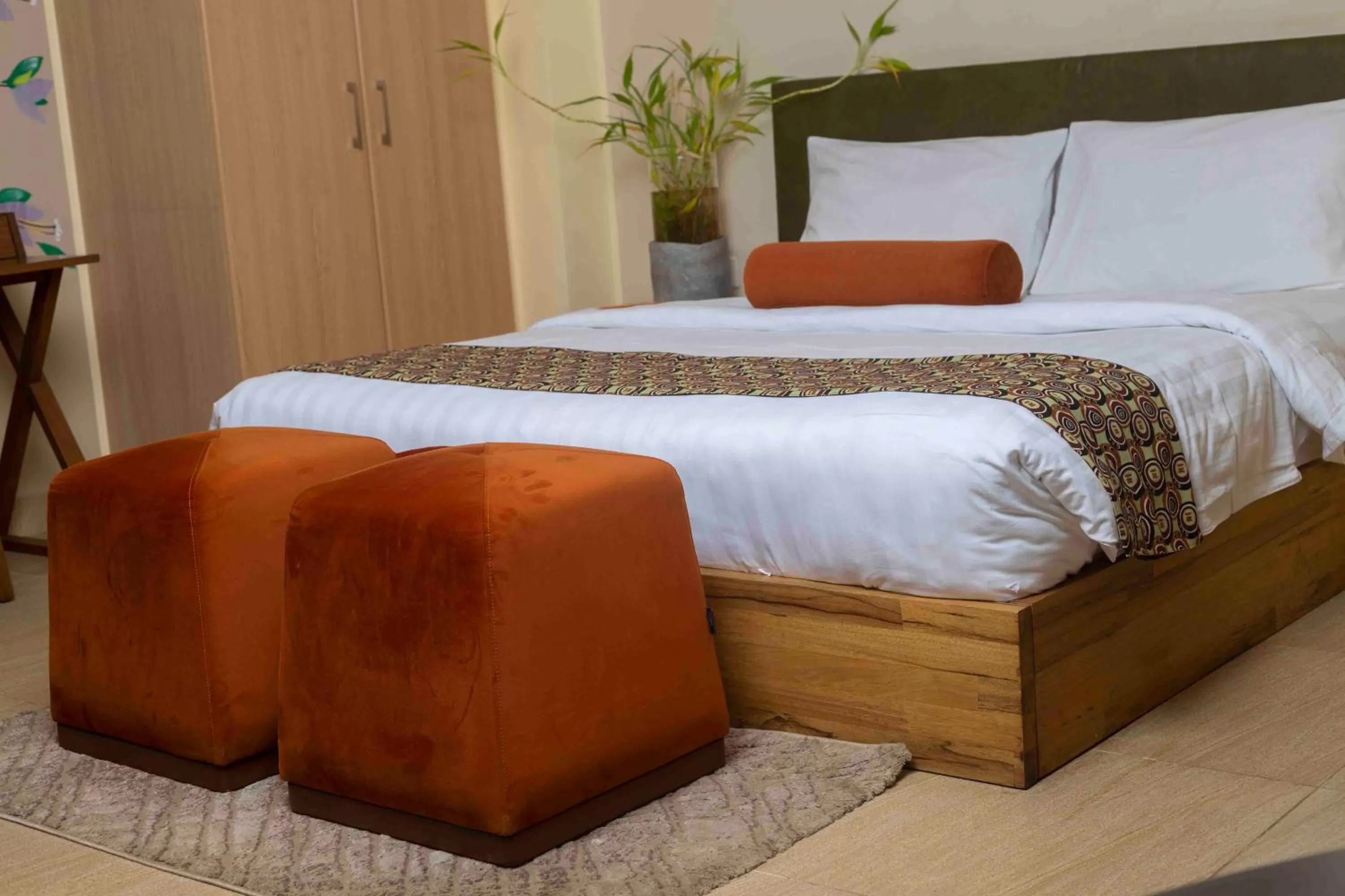 Bed in Roots Hotel Apartment