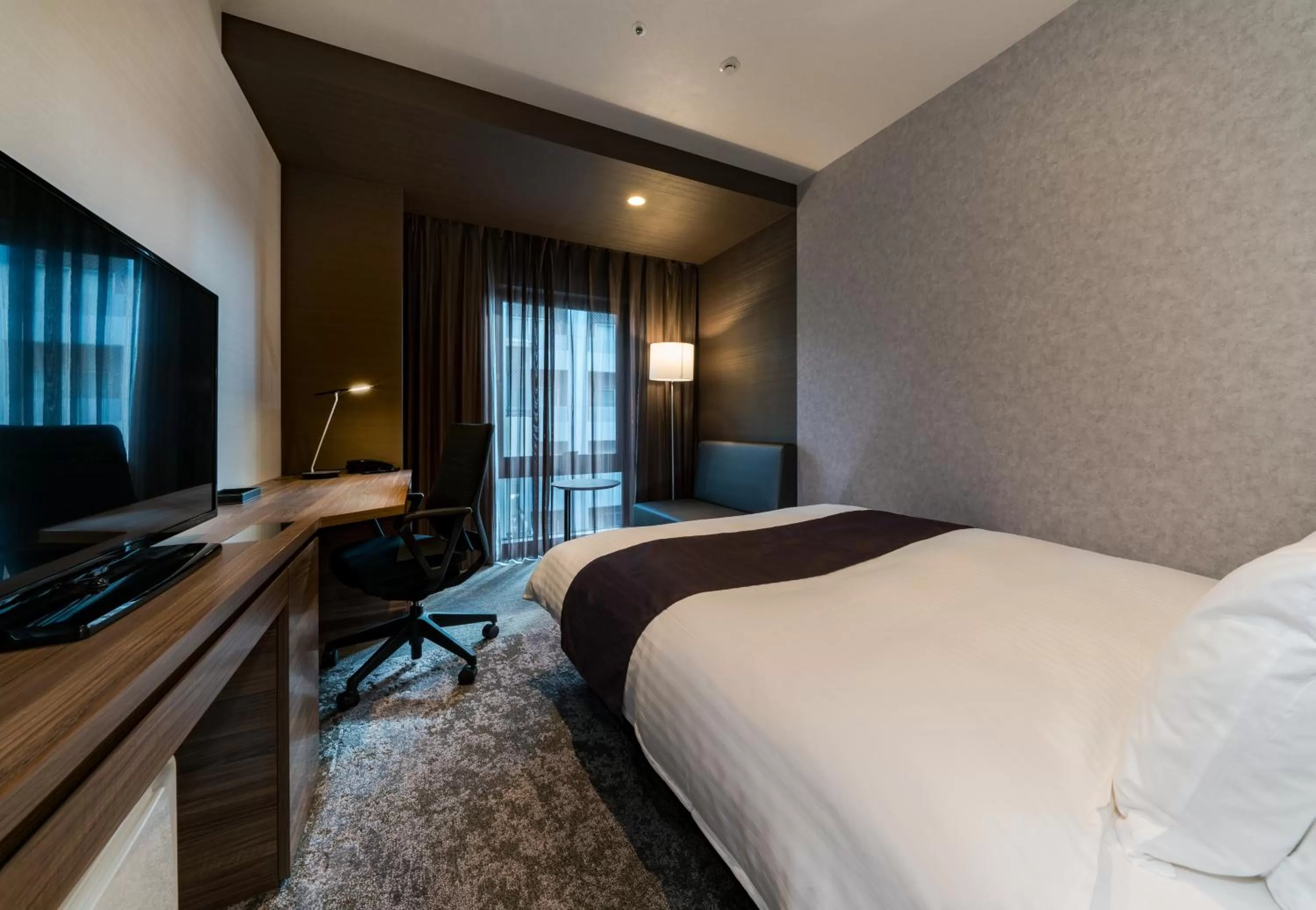 Bed in Daiwa Roynet Hotel Hakata Reisen PREMIER