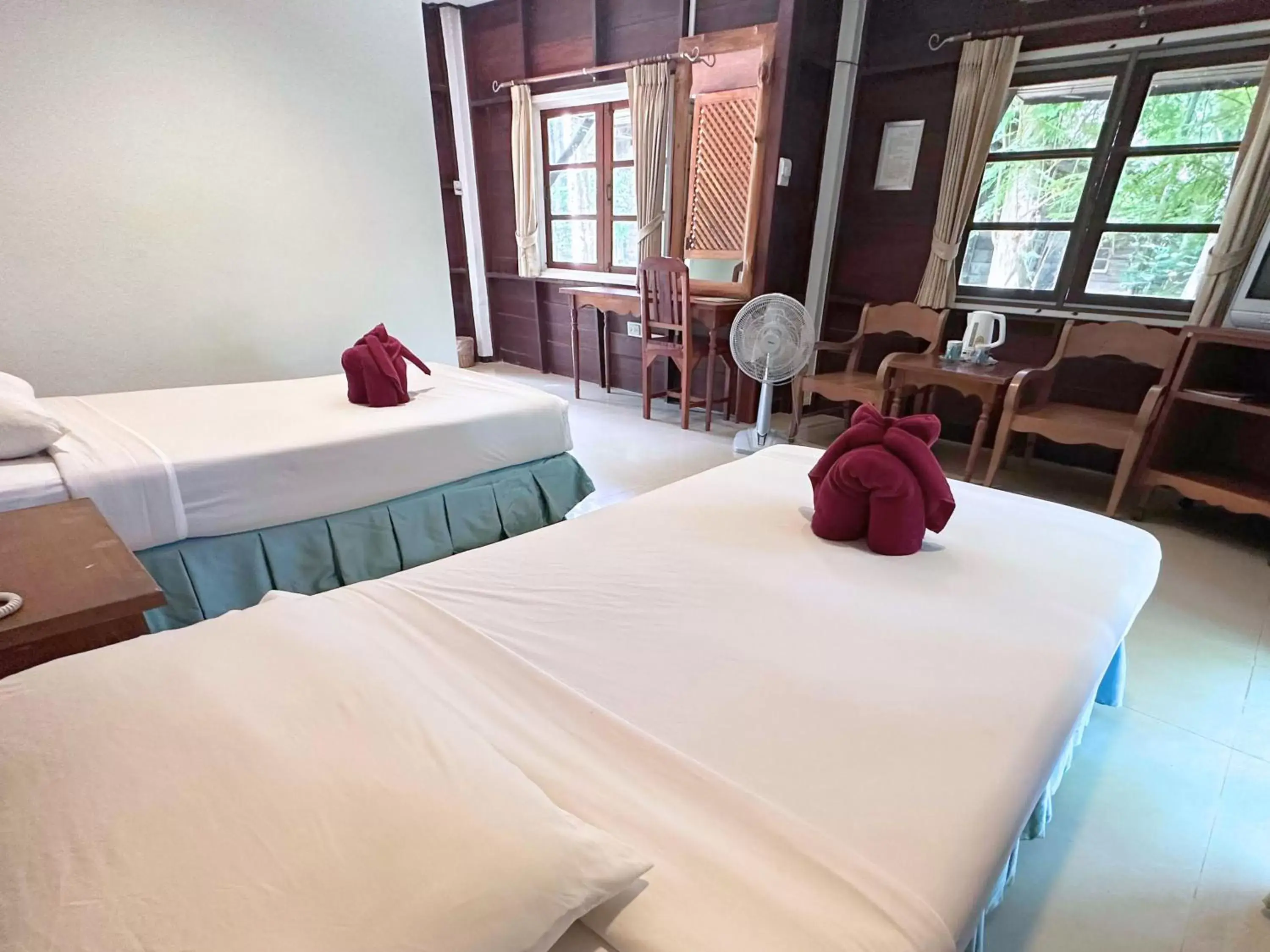 Bed in The Legacy River Kwai Resort