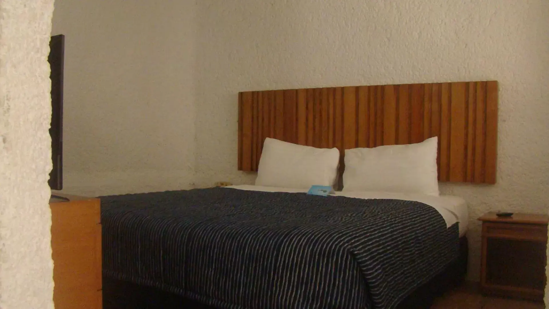 Bed in Puerto Nuevo Baja Hotel & Villas