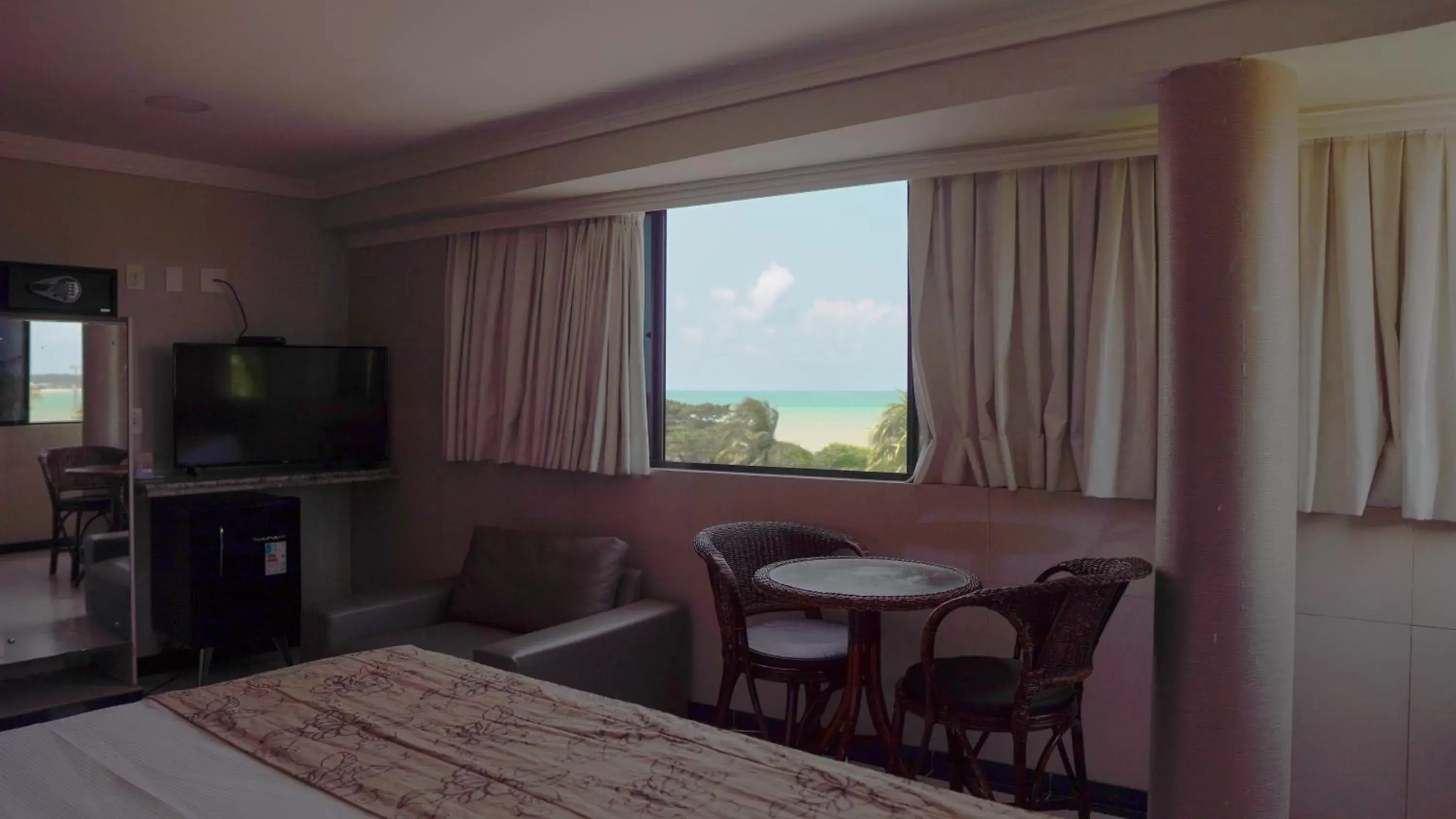 Bedroom, Seating Area in Atlântico Praia Hotel