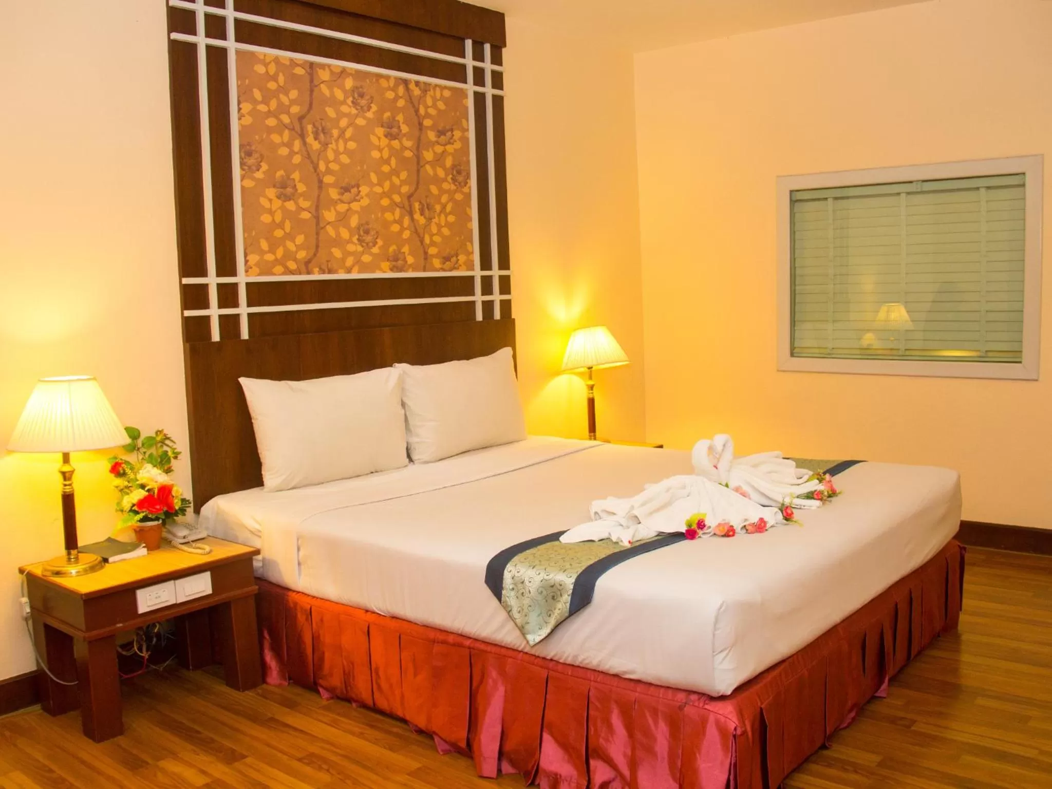 Bed in Friendlytel Hotel