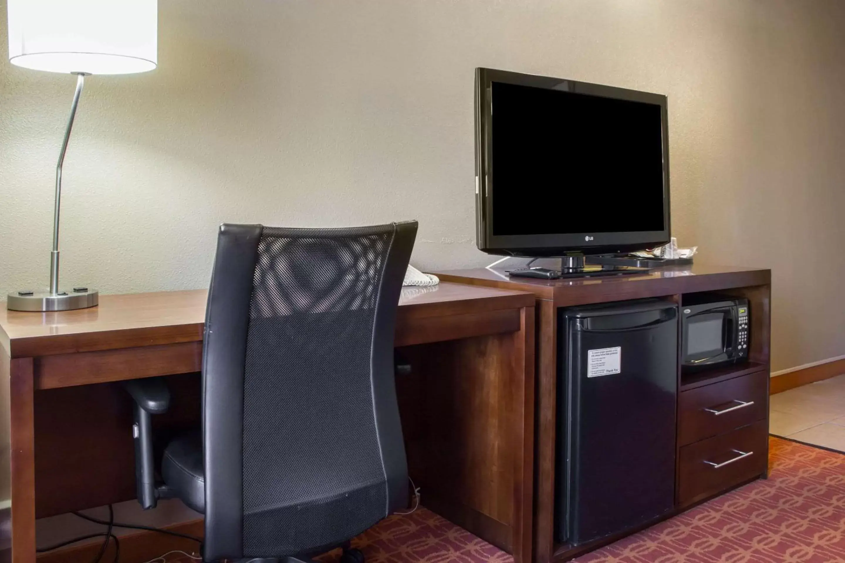 Photo of the whole room, TV/Entertainment Center in Comfort Inn & Suites near Kino Sports Complex