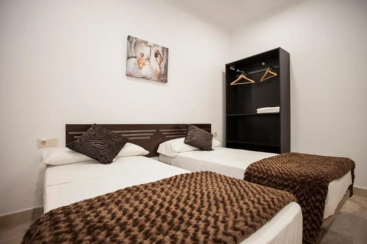 Bedroom, Bed in Hostal Rincón de Sol