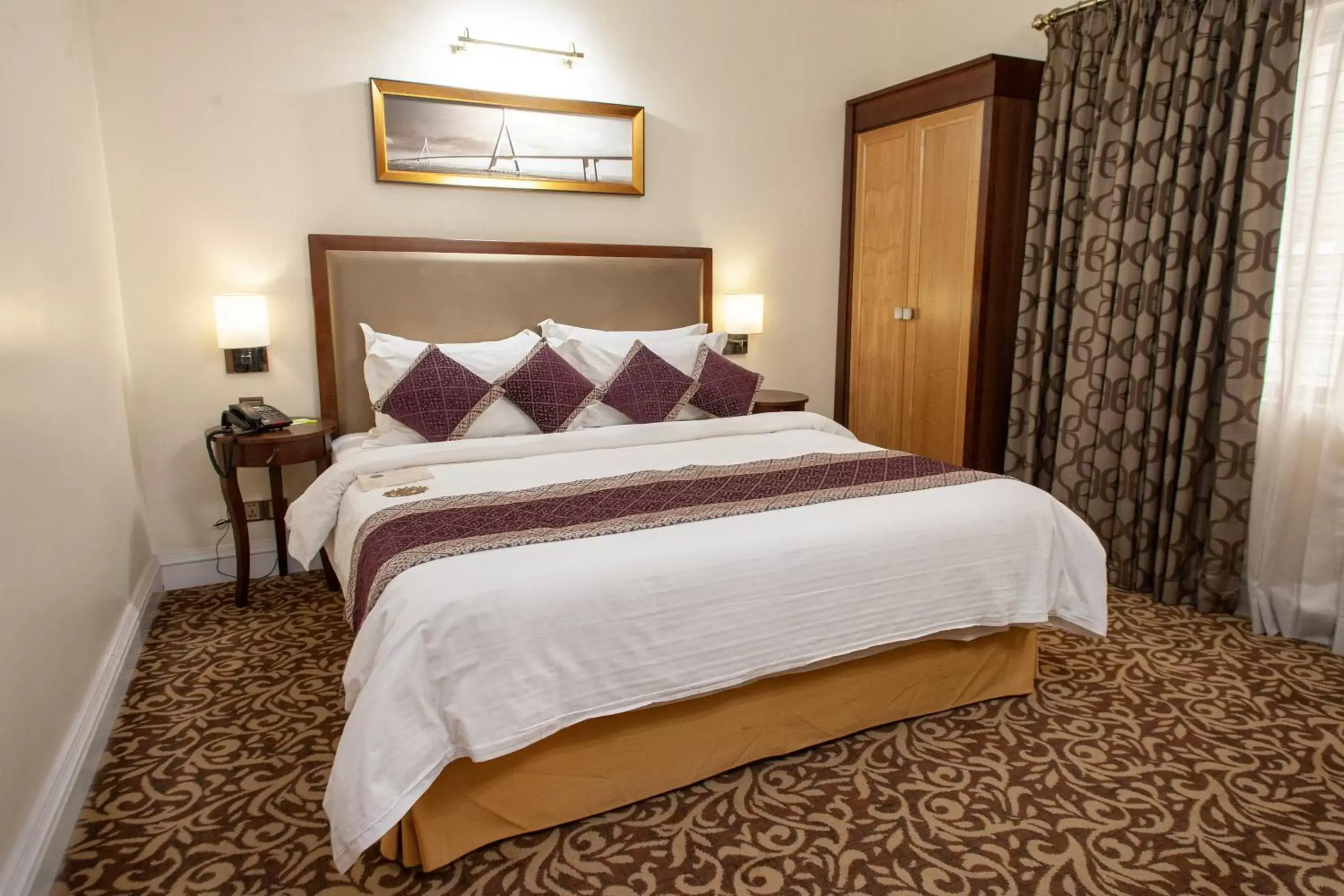 Bed in Royal Park Residence Hotel