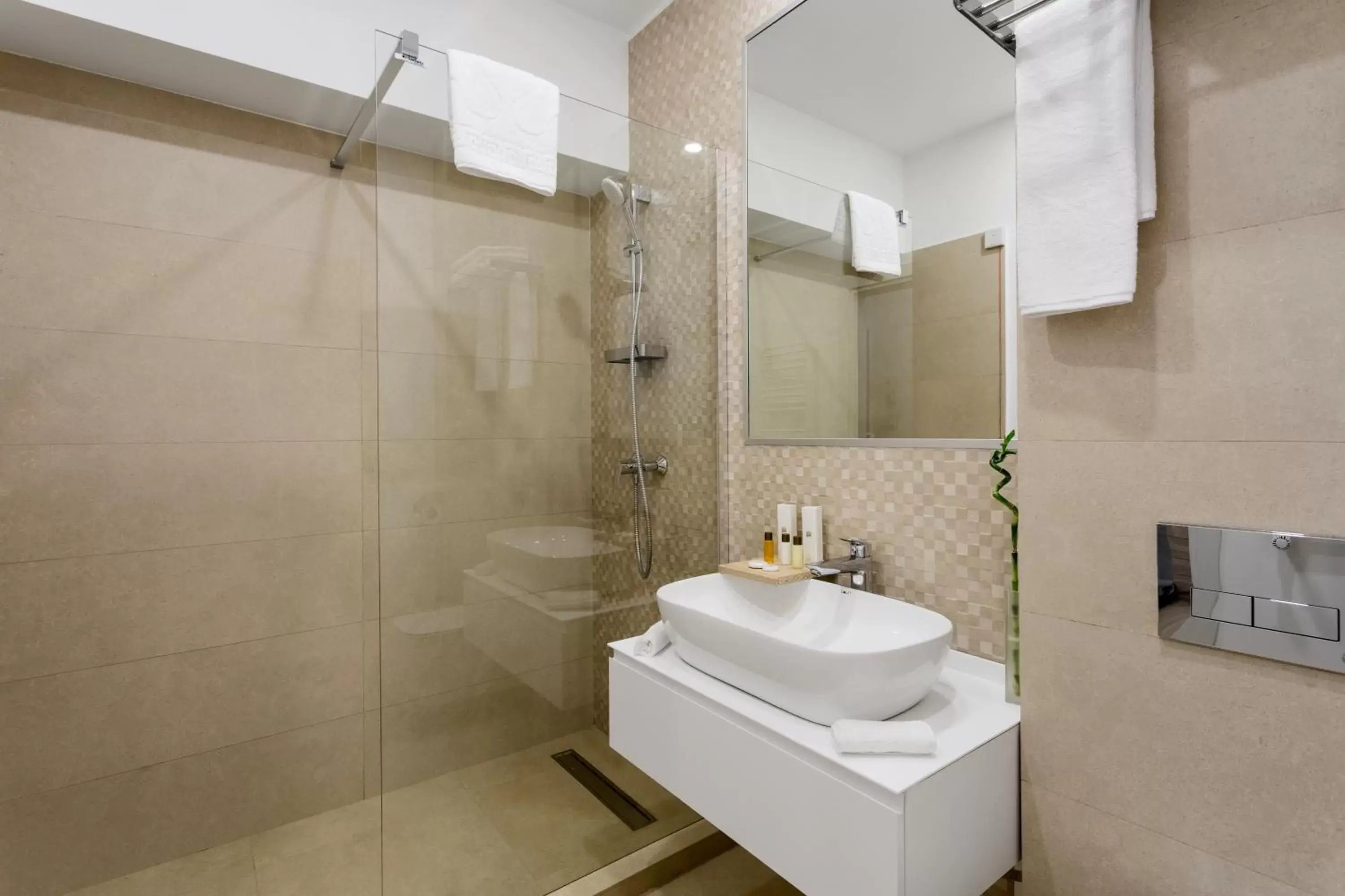 Bathroom in Athina Suites Hotel