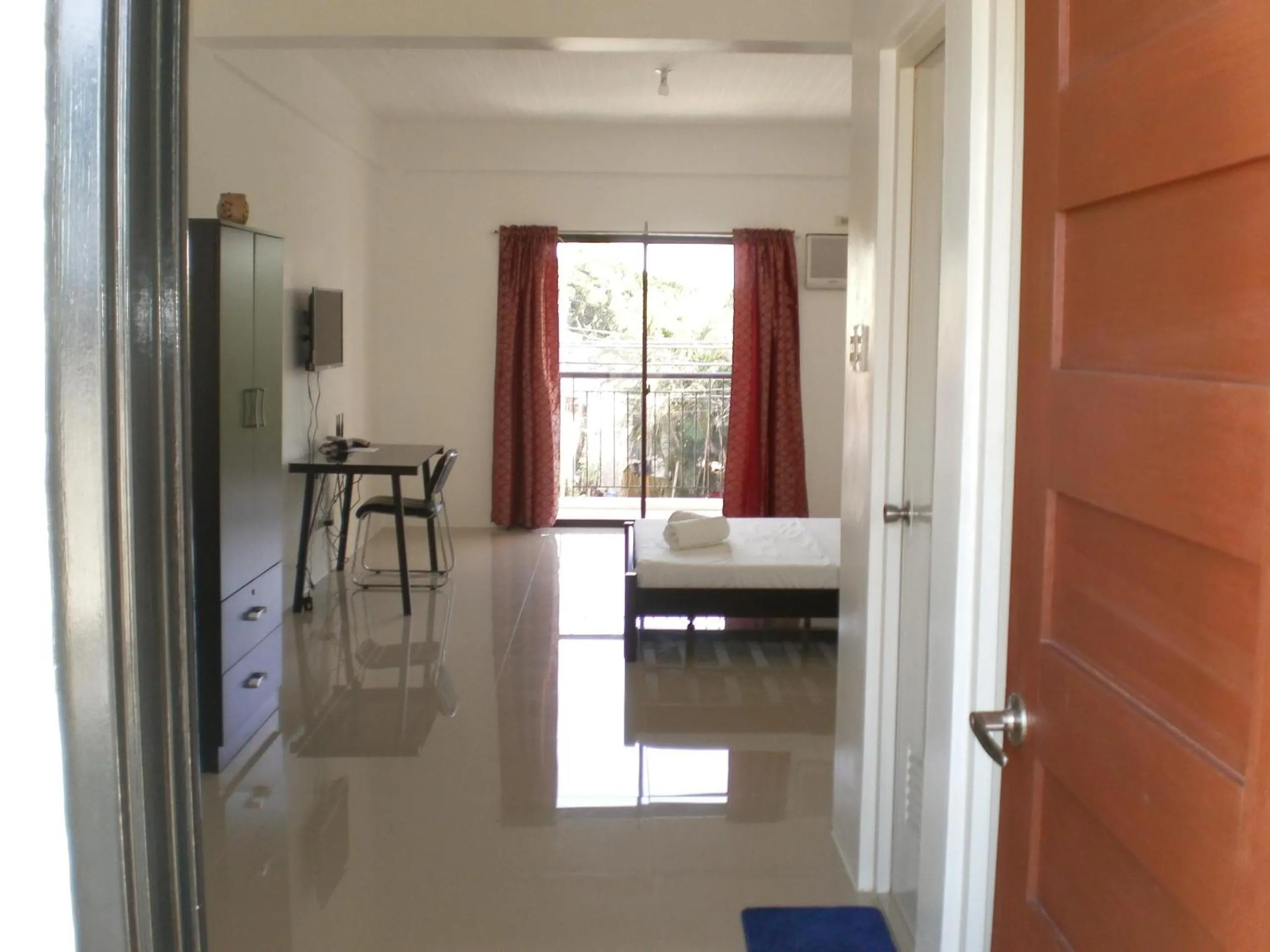 Photo of the whole room, Bed in The Palines Apartment Hotel near Brittany Palazzo, Evia Mall Alabang