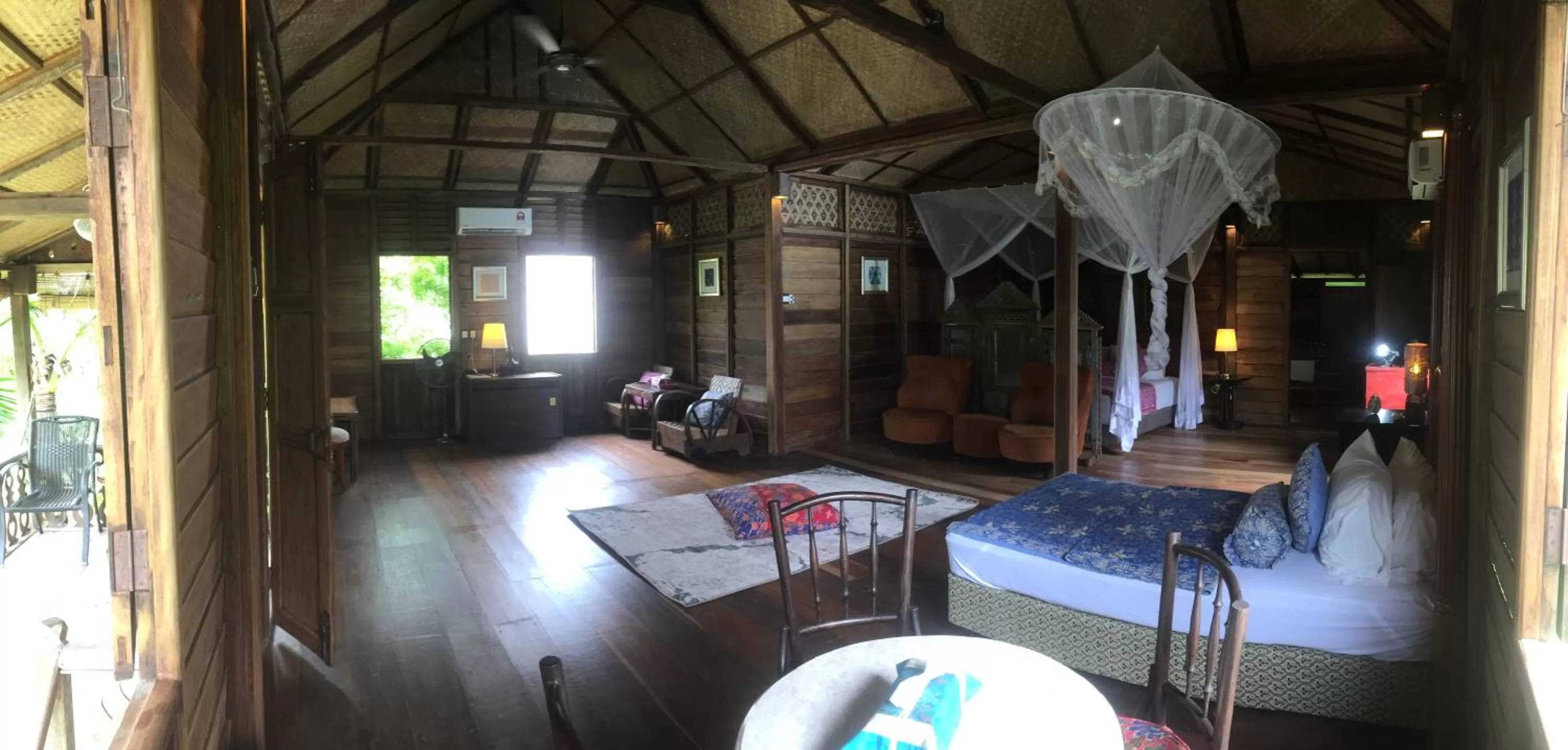 Bed in Kunang Kunang Heritage Villas