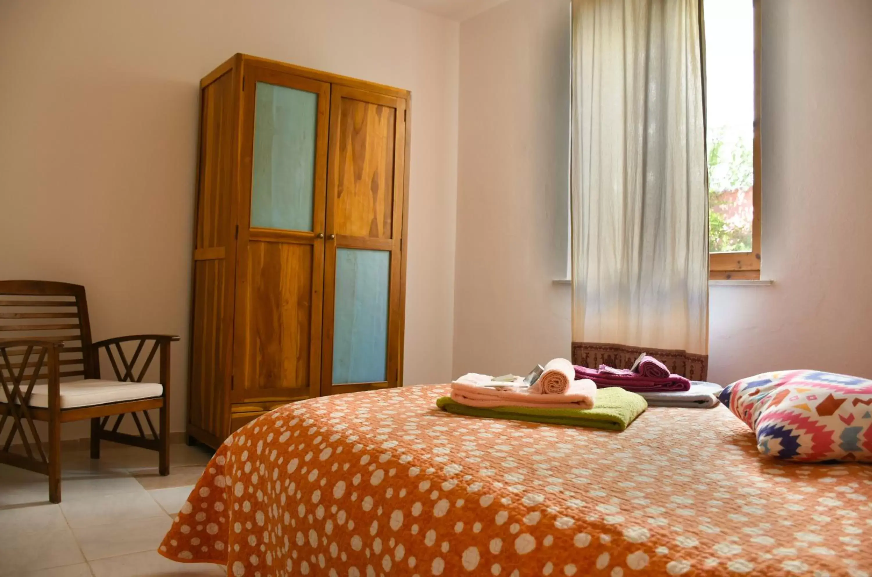 Bed in Flowery Inn Villa