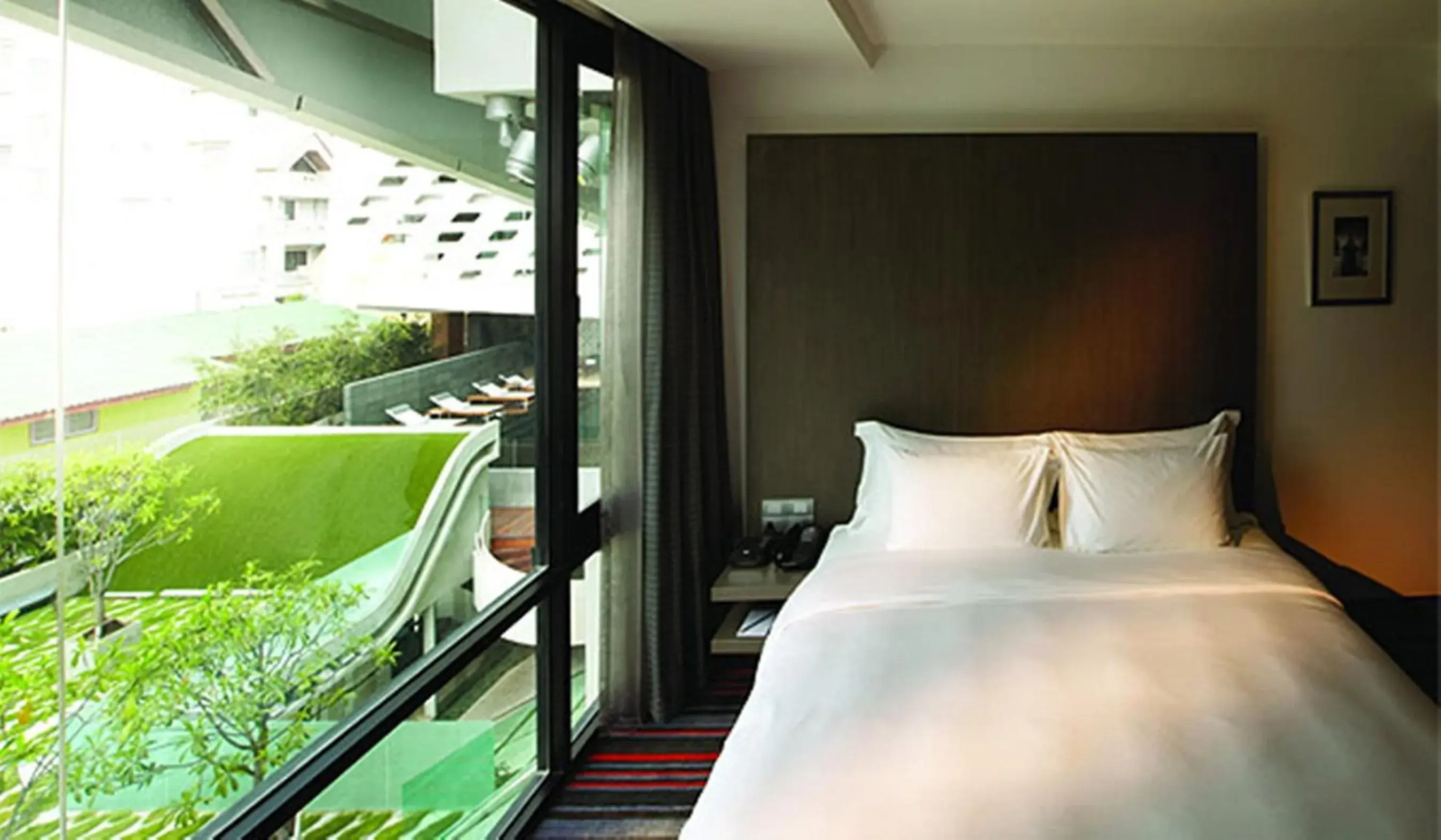 Bed in LiT BANGKOK Hotel - SHA Extra Plus