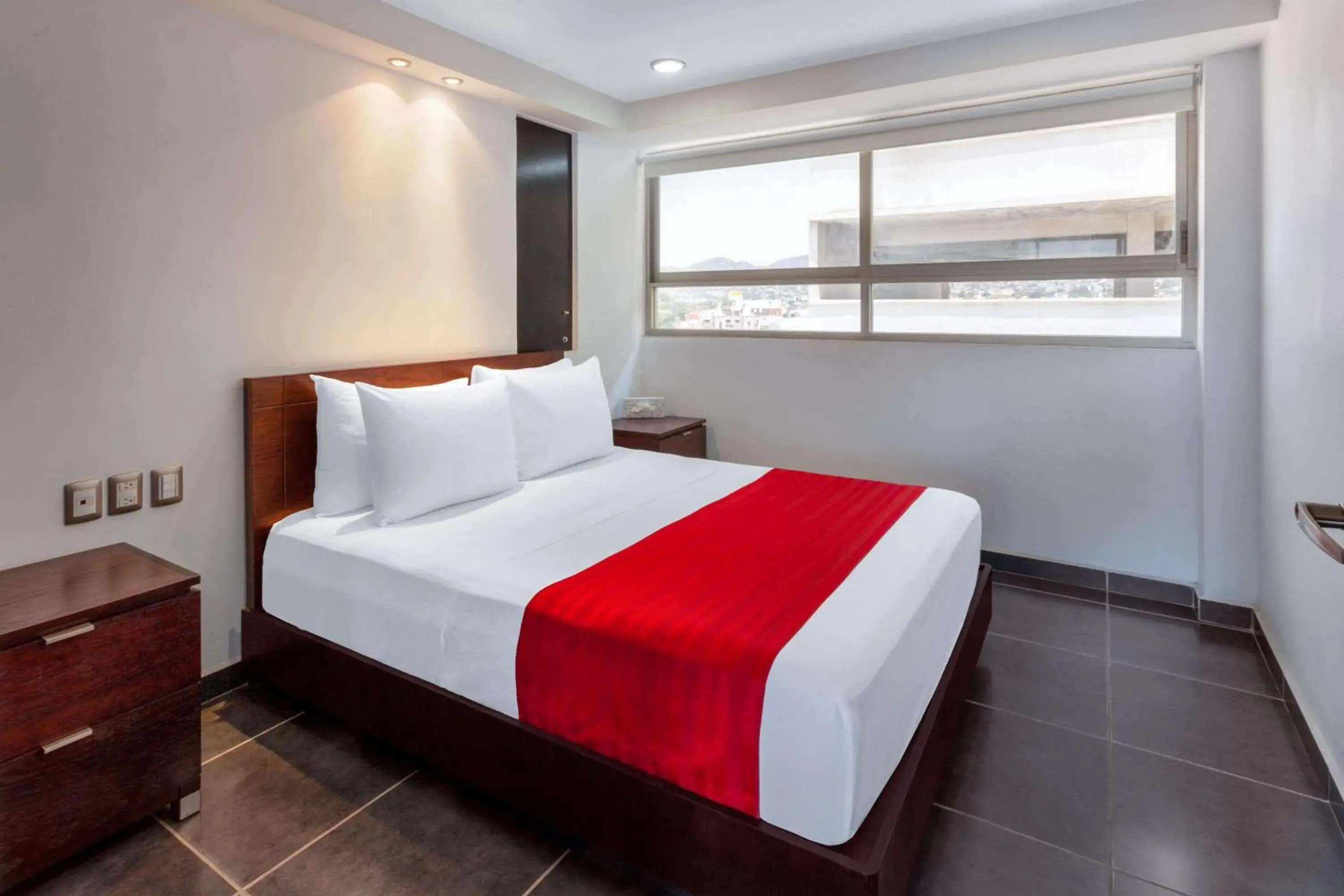 Photo of the whole room, Bed in Ramada by Wyndham Acapulco Hotel & Suites