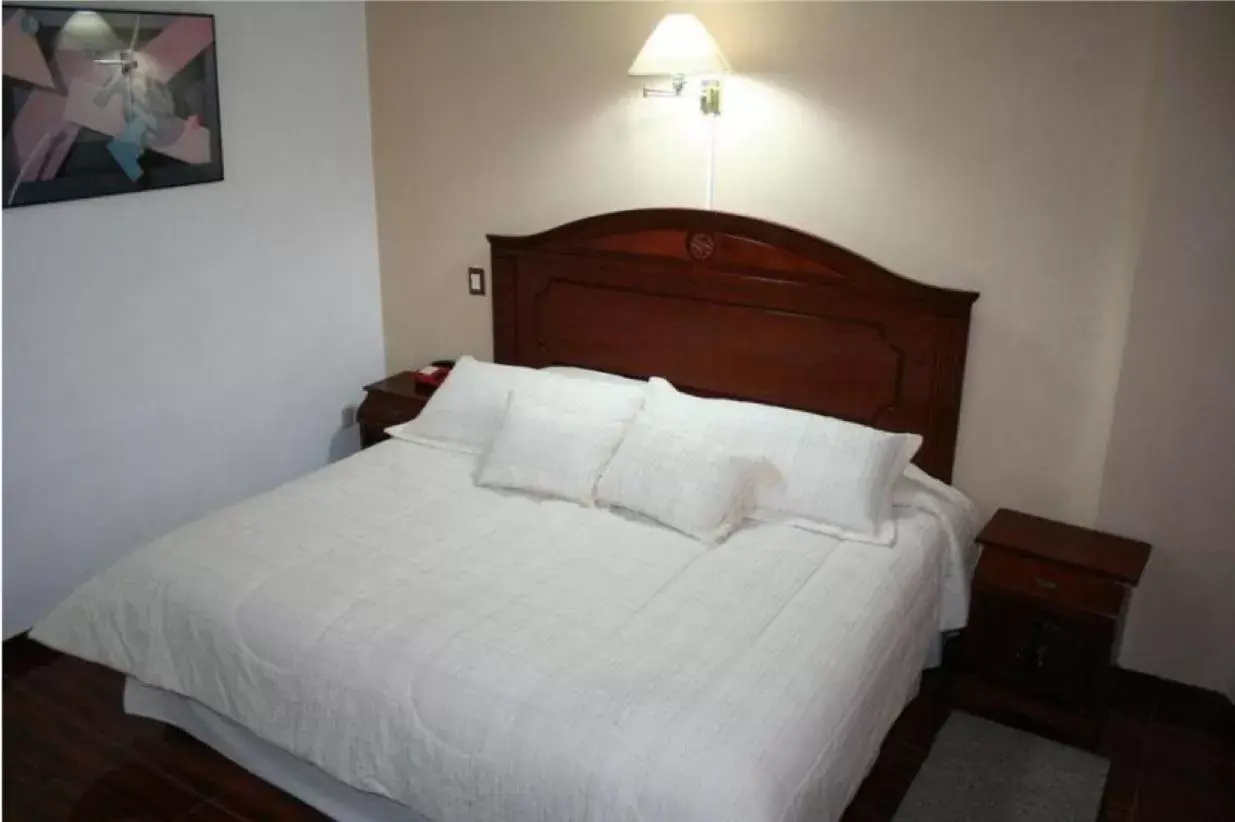 Bed in Leo Hotel