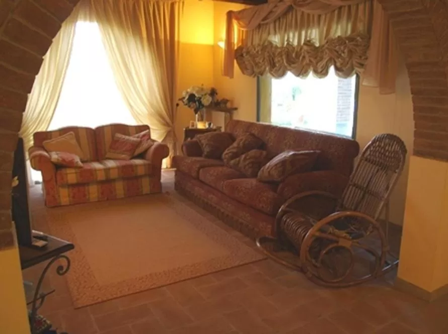 Communal lounge/ TV room in B&B Il Casolare Di Bonci