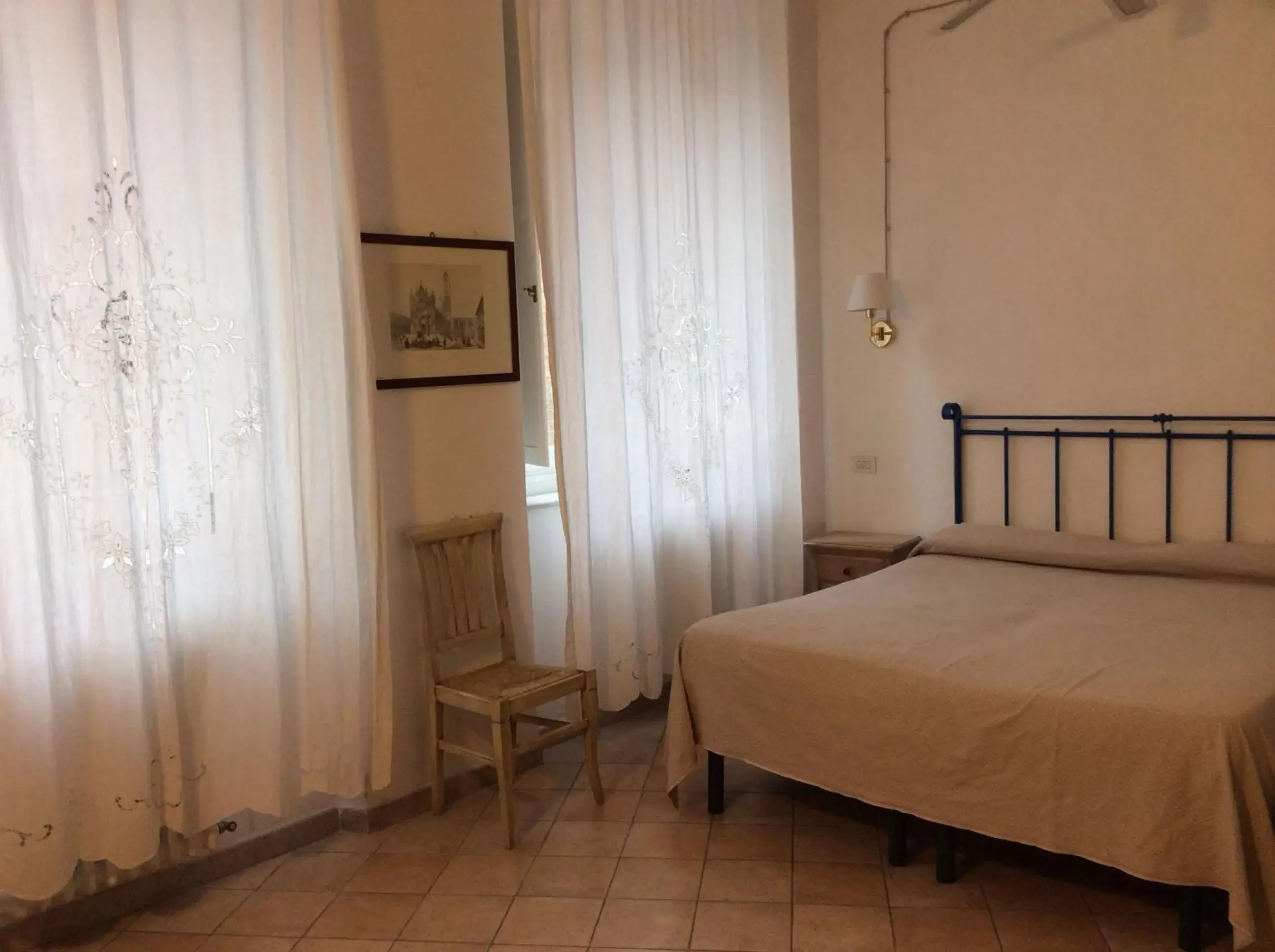 Bed in Albergo Cannon d'Oro