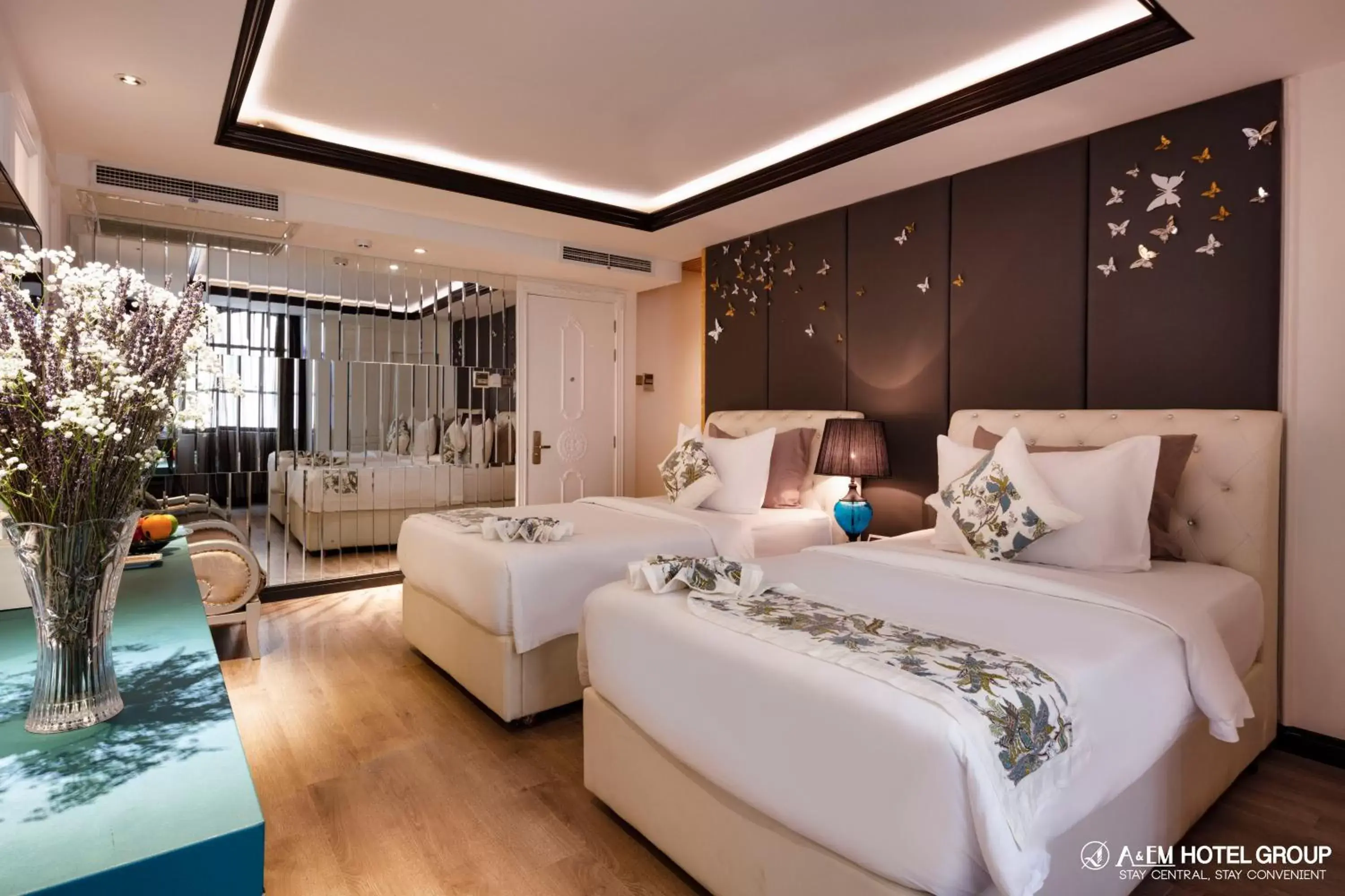 Bed in A&EM Saigon Hotel Bed in A&EM Saigon Hotel