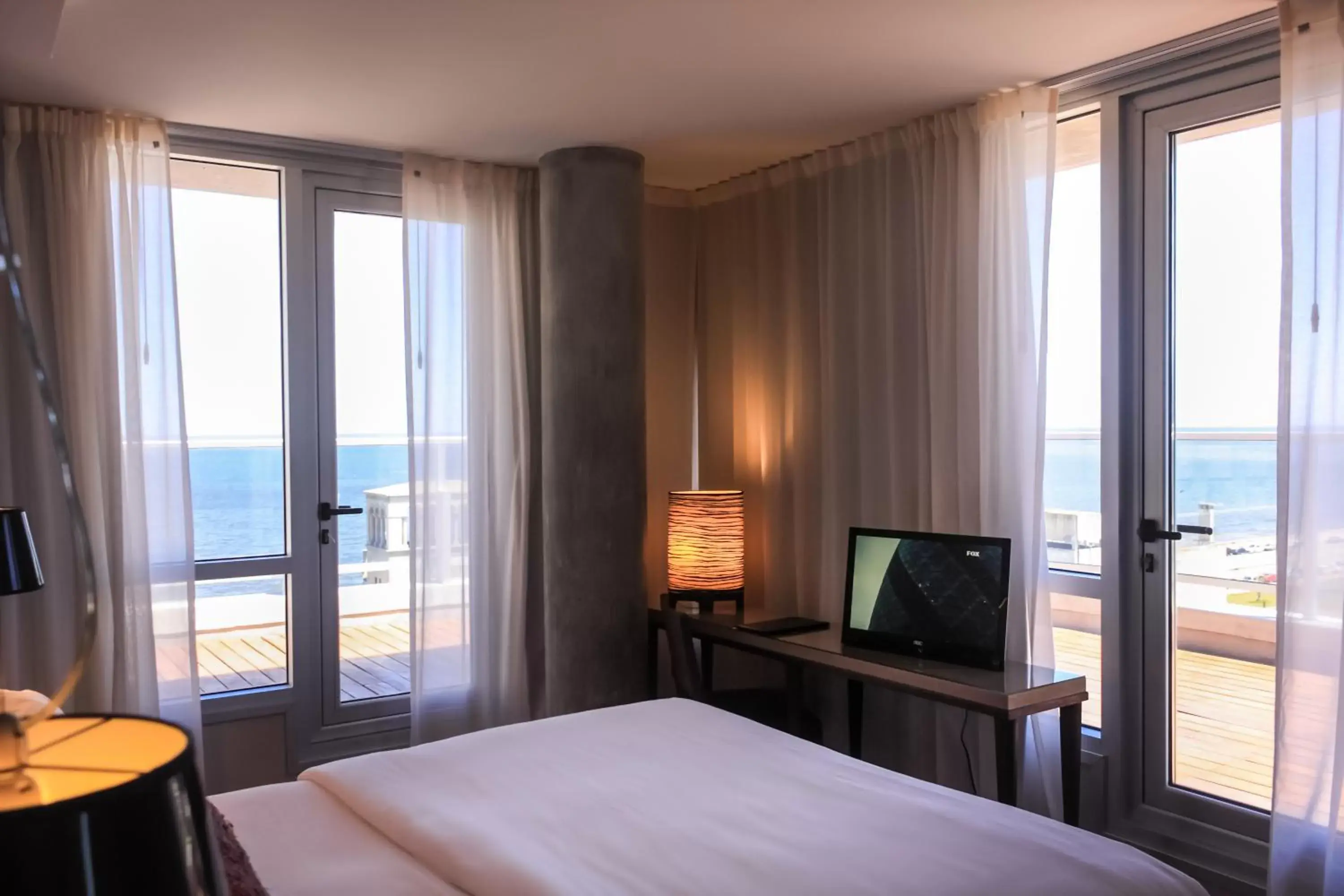 Bedroom, Sea View in AXSUR Design Hotel